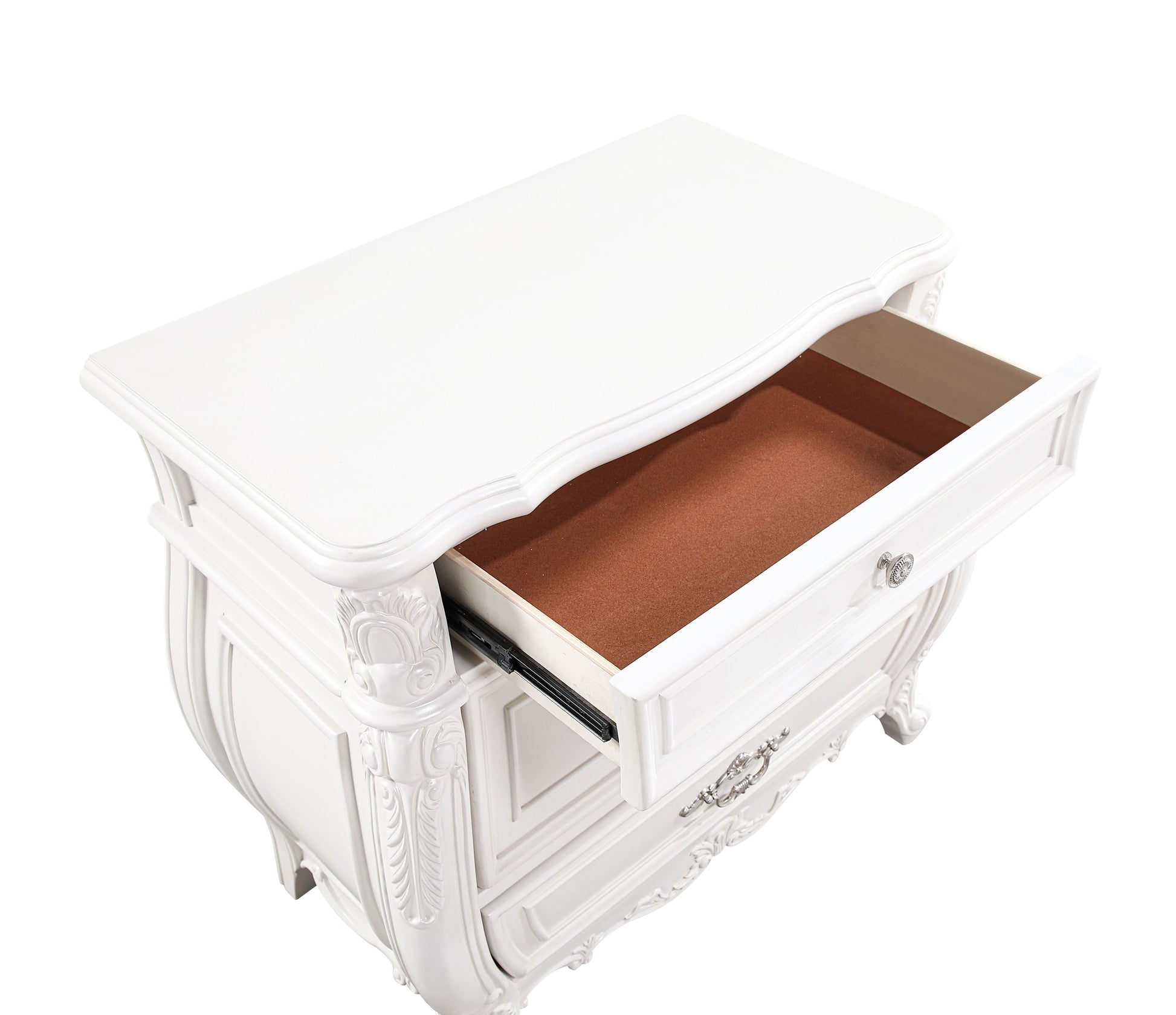 White ornate dresser with one open drawer and decorative hardware