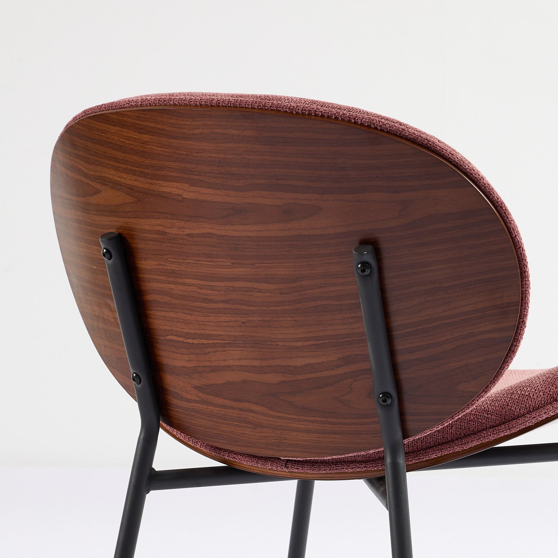 Elegant walnut veneer accent chair with textured rose fabric upholstery and black metal legs