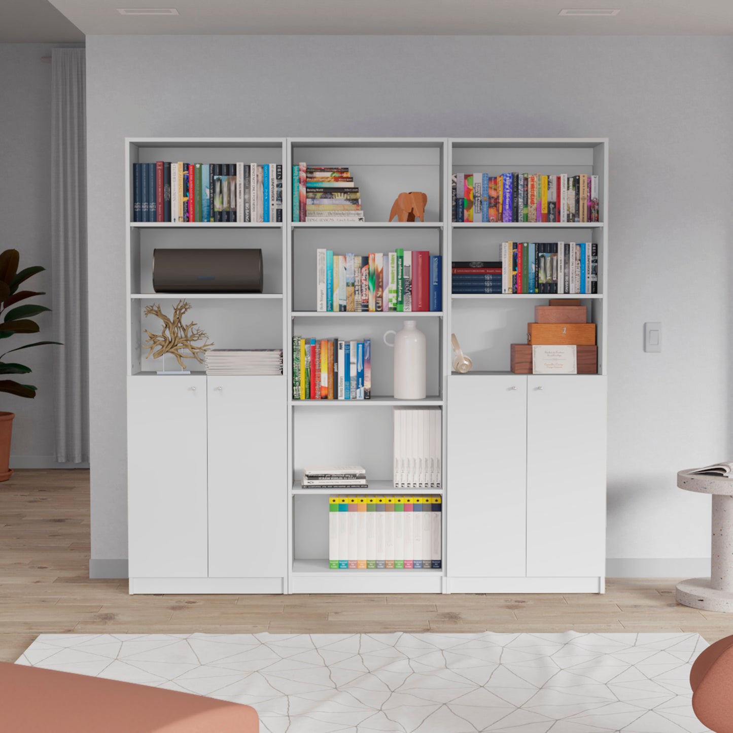 White modular bookshelf with varied shelving and cabinet storage