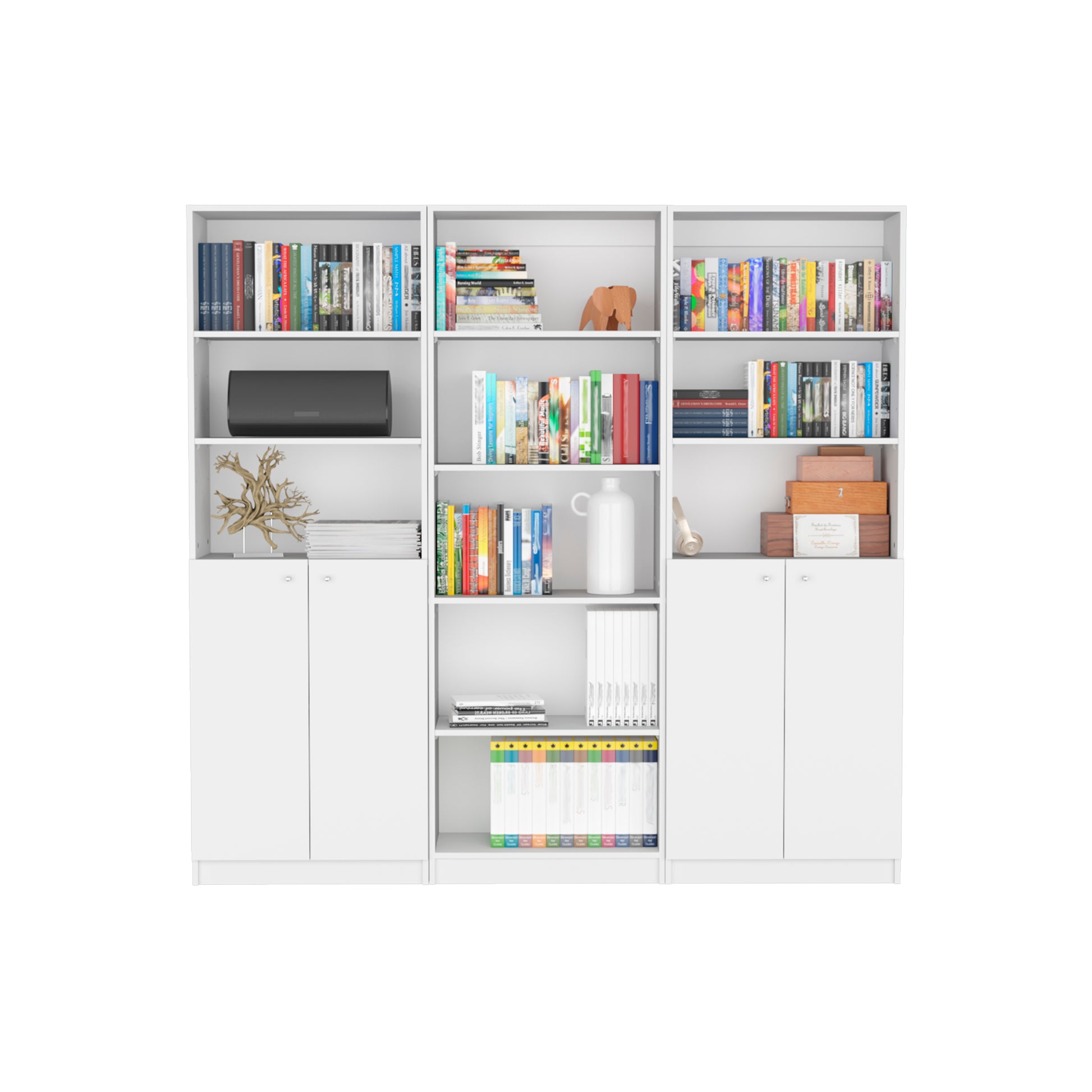 White modular bookshelf with assorted books a black speaker and decorative items