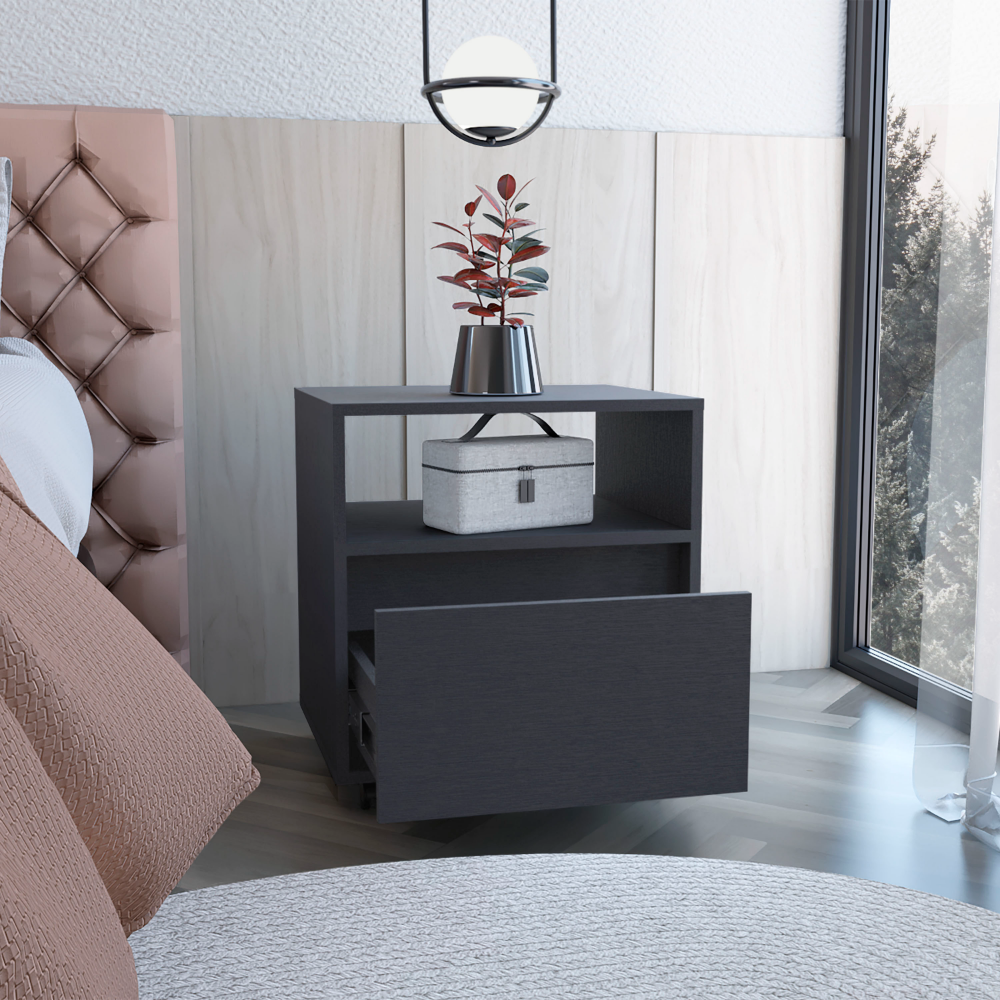 Dark gray modern bedside table with open drawer and decorative plant