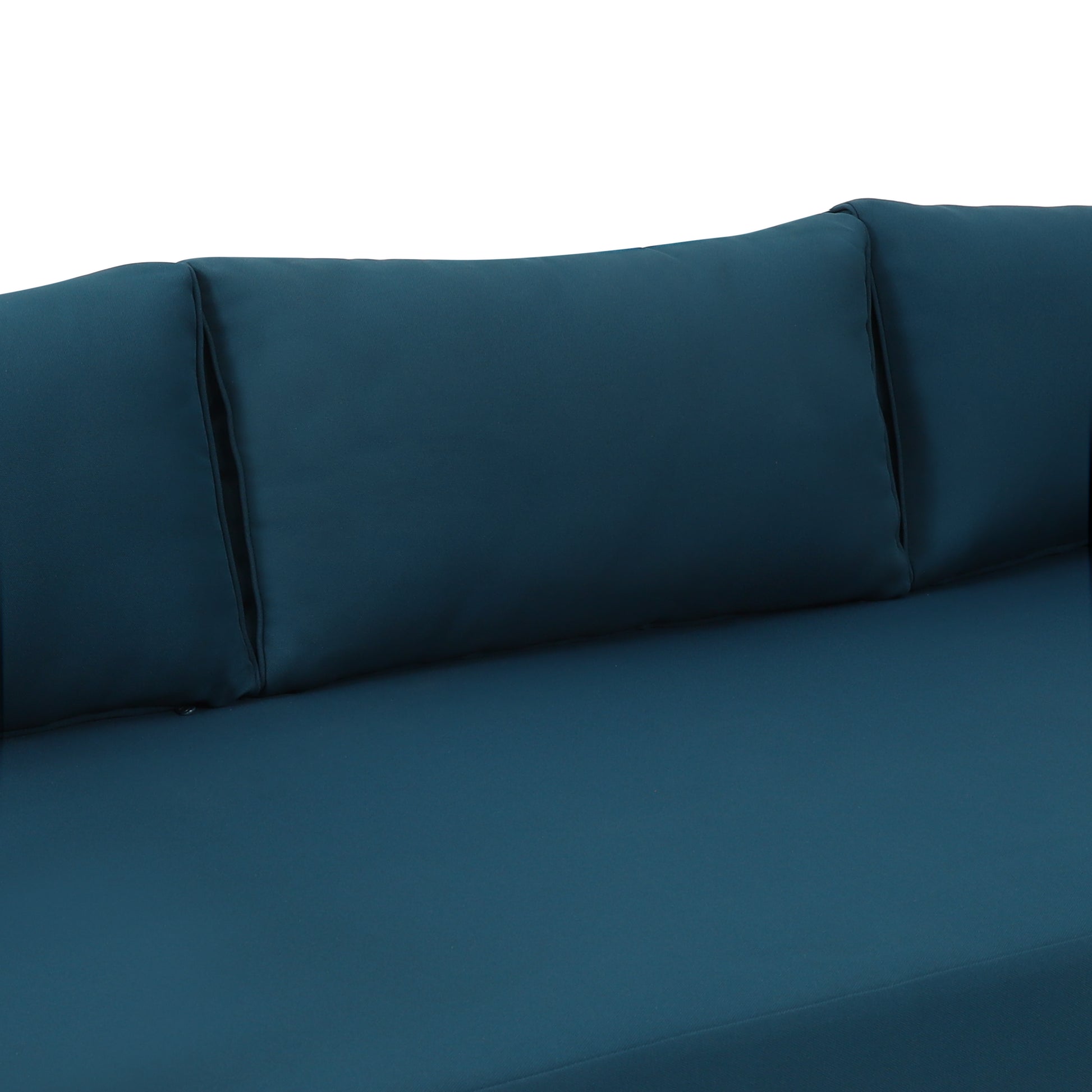 Teal fabric sofa with plush back cushions and piped edges