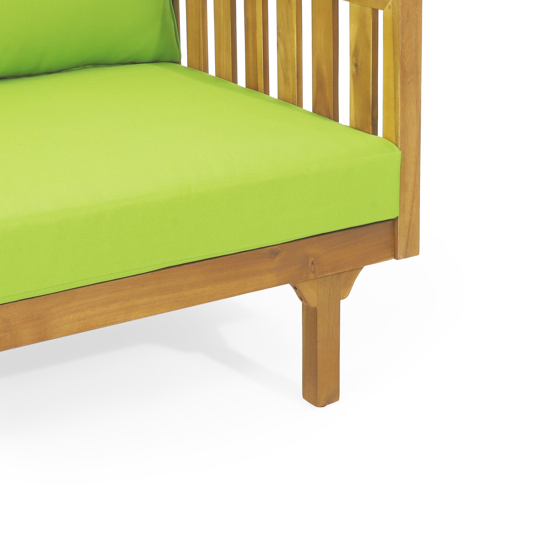 Closeup of a wooden outdoor chair with a vibrant lime green cushion