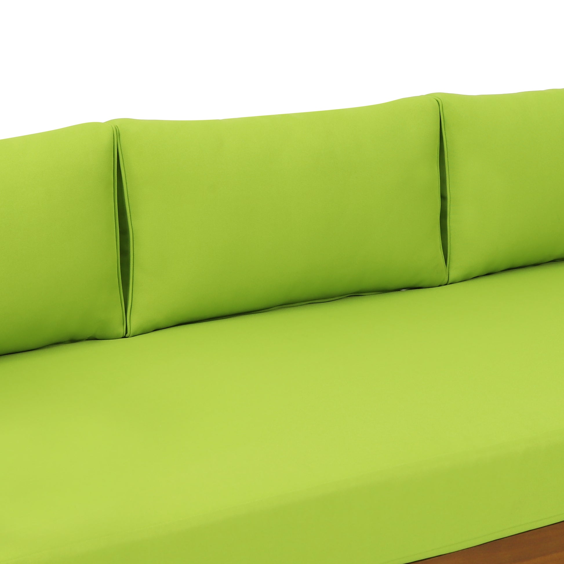 Bright lime green outdoor sofa cushions with tufted backrest detail
