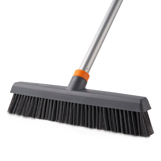 Gray floor broom with black bristles and aluminum handle