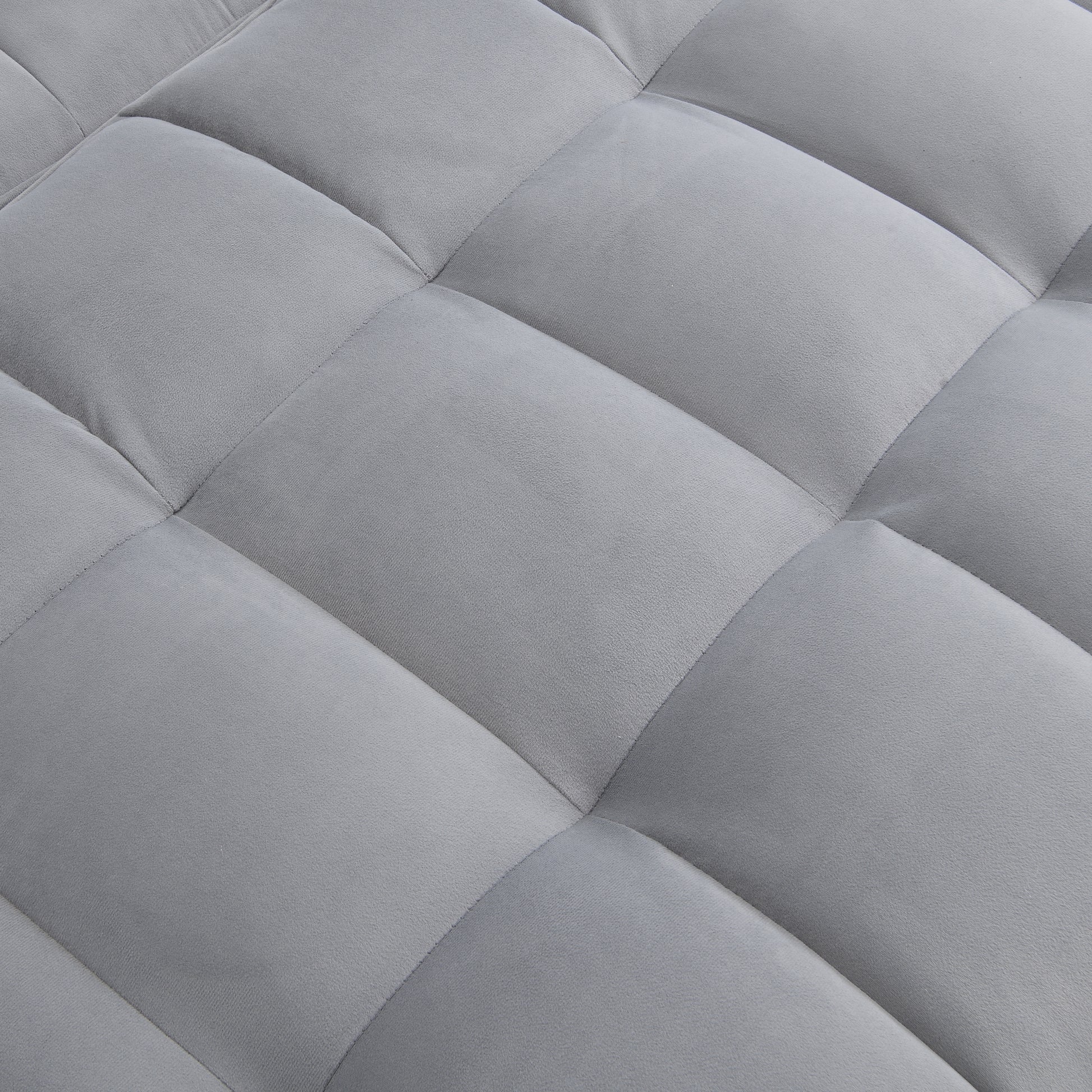 Closeup of plush grey fabric with diamond quilting ideal for upholstery projects