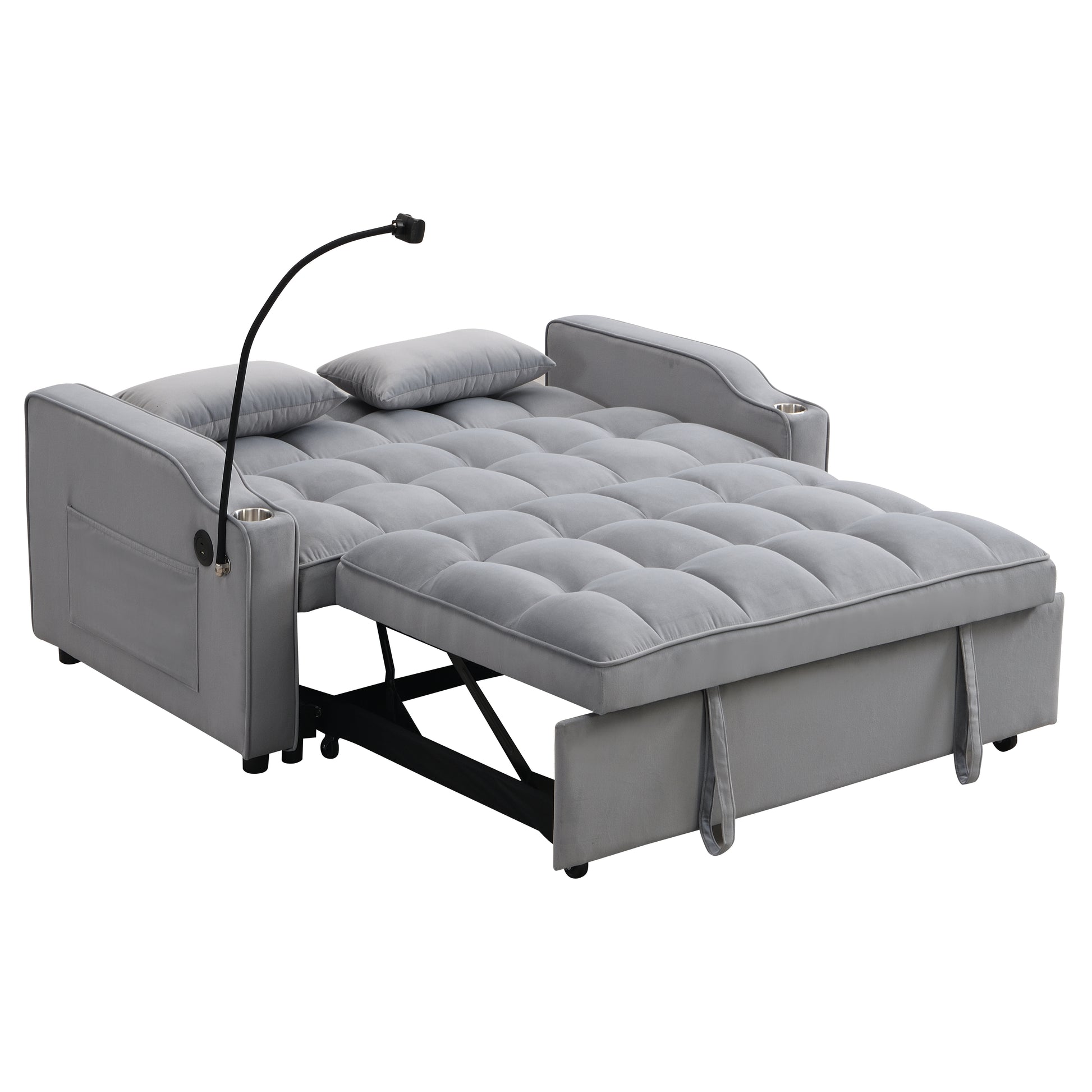 Grey velvet sofa bed with tufted cushions and adjustable reading lamp