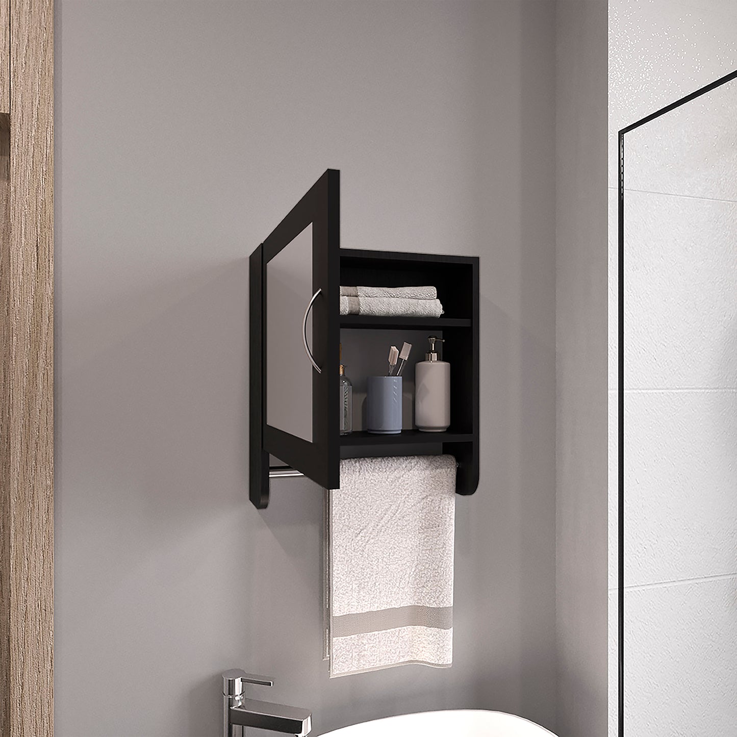 Black medicine cabinet with mirror and towel bar organizing bathroom essentials