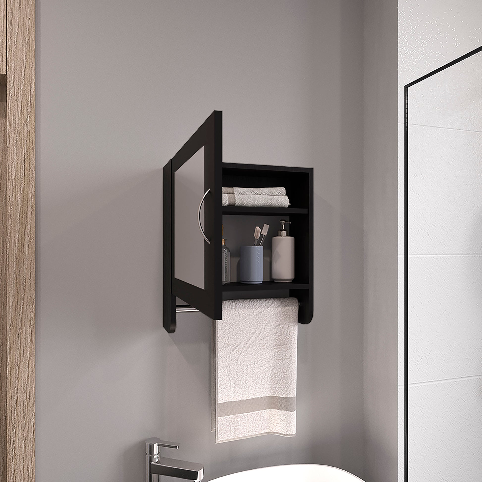 Black medicine cabinet with mirror and towel bar organizing bathroom essentials
