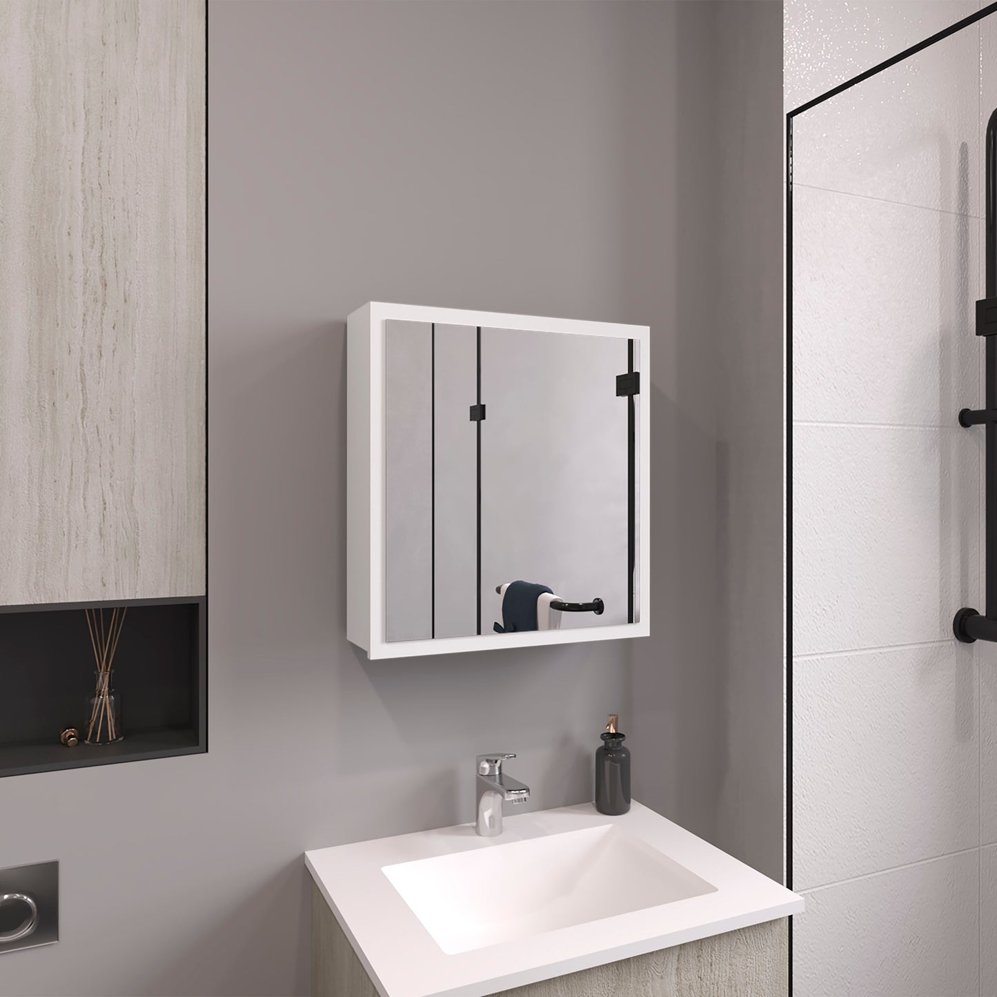Modern white bathroom medicine cabinet with mirrored doors and black hardware