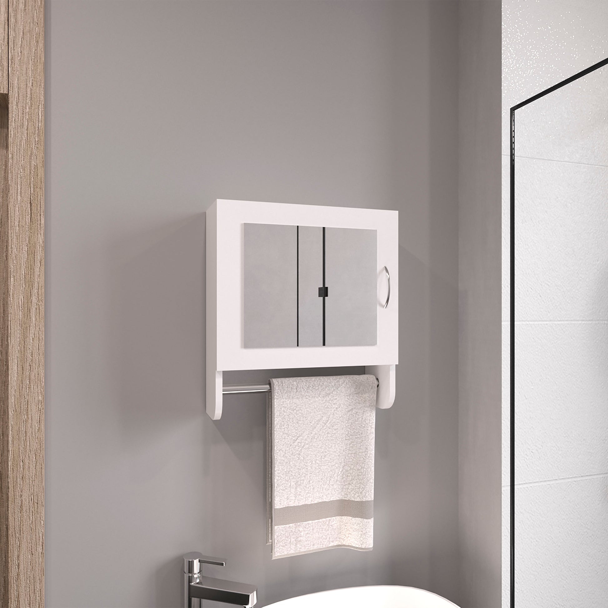 White mirrored bathroom cabinet with integrated towel bar and plush towel