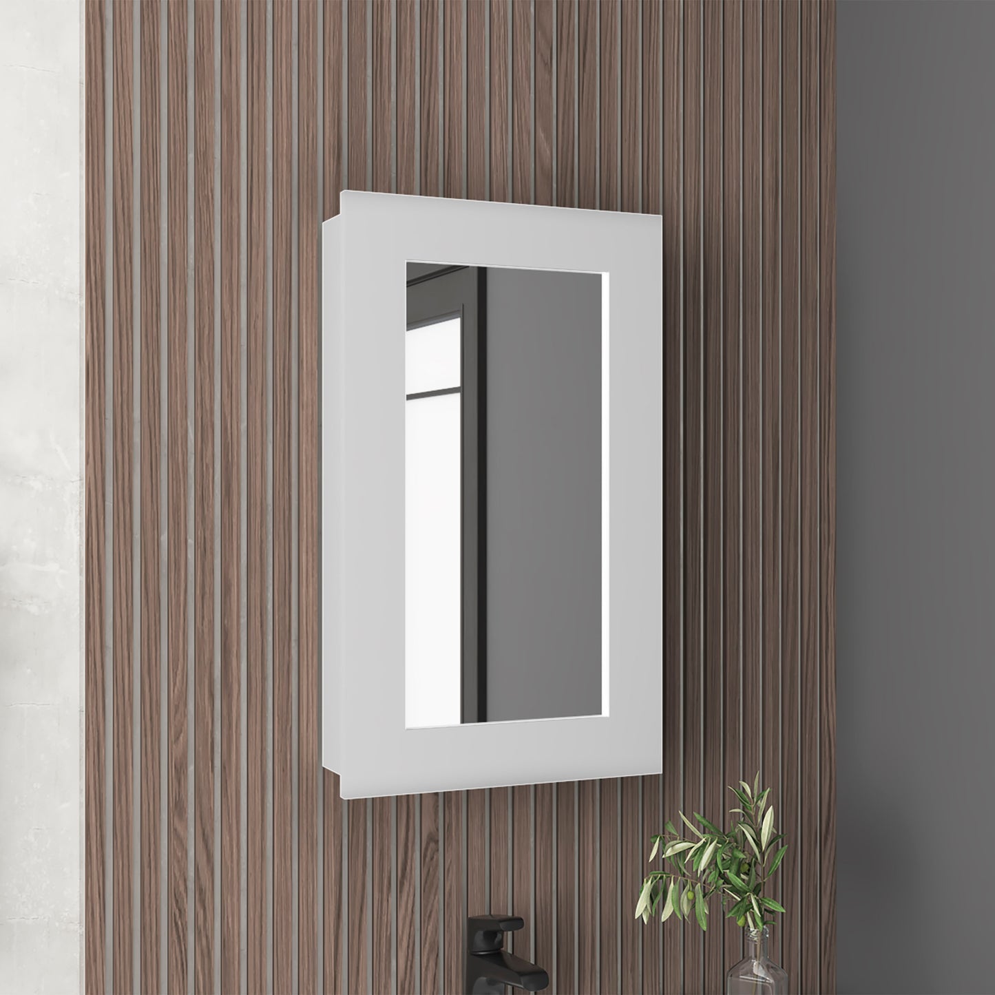 White recessed medicine cabinet with integrated LED lighting and a mirrored door