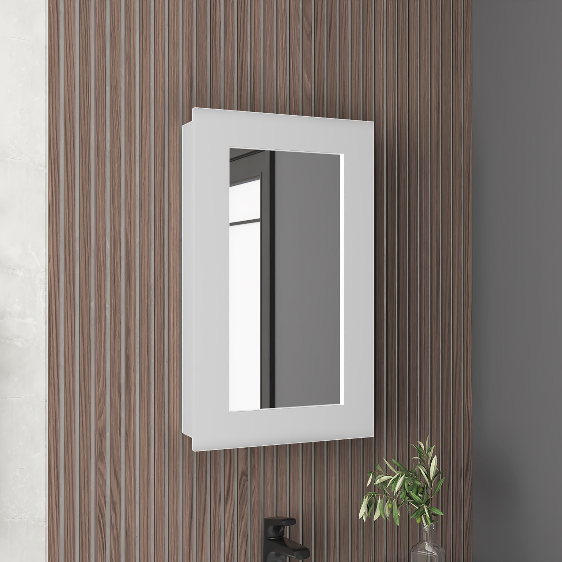 White recessed medicine cabinet with integrated LED lighting and a mirrored door