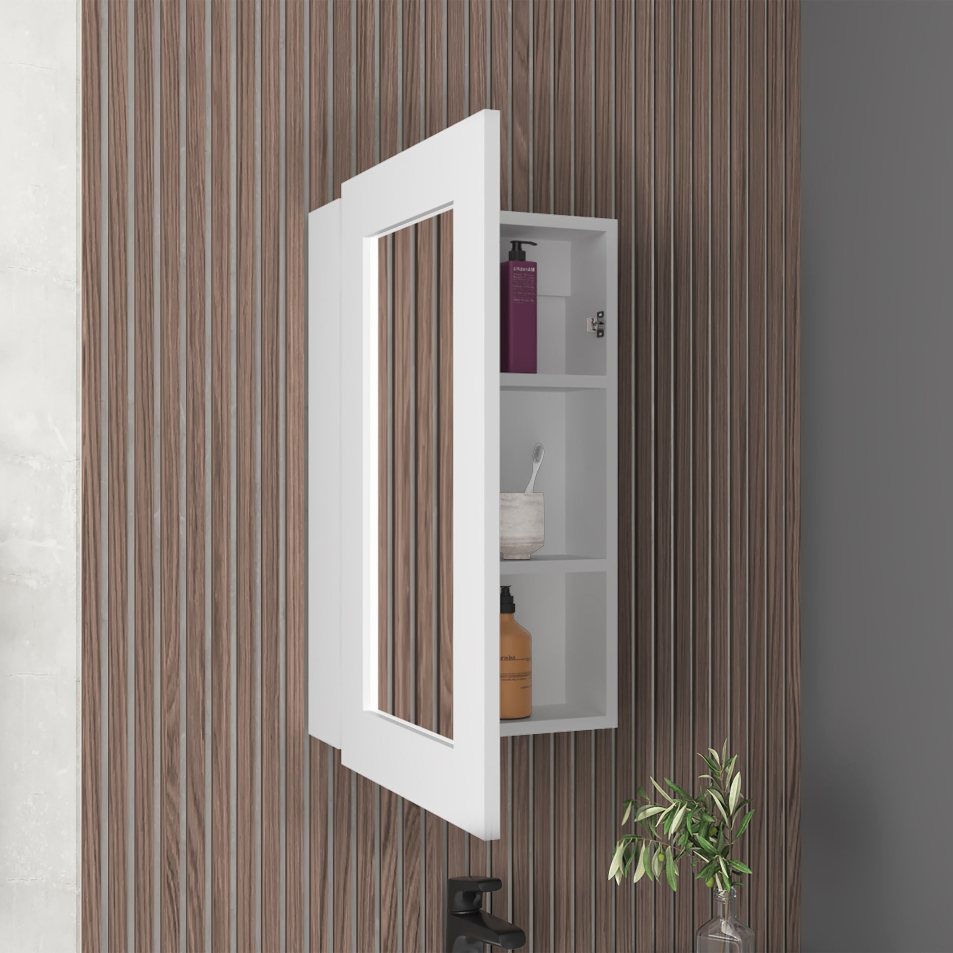 White mirrored medicine cabinet with internal shelves holding toiletries