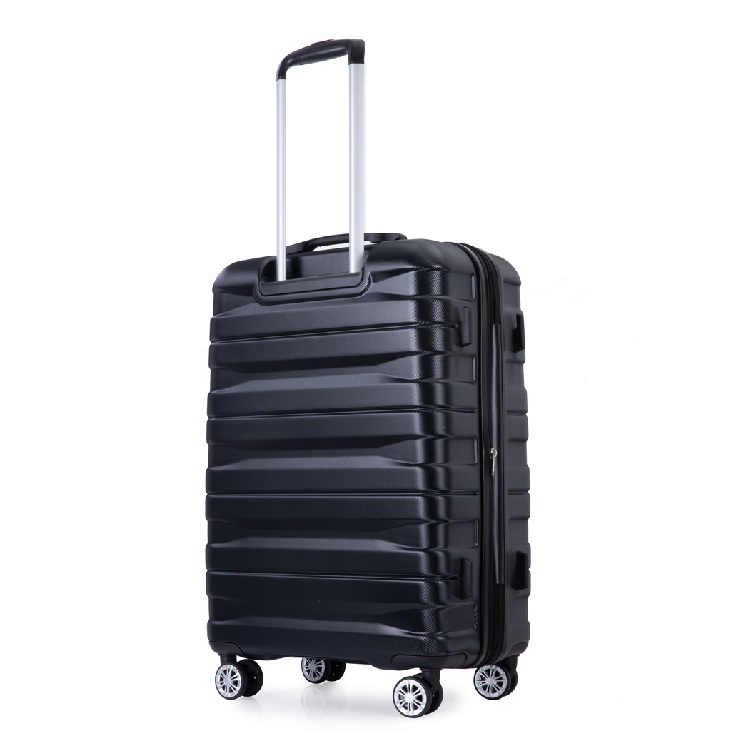 Sleek black hardshell suitcase with telescoping handle and spinner wheels for travel