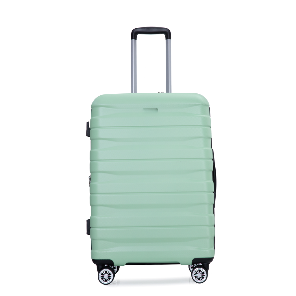 Light green hardshell suitcase with telescoping handle and spinner wheels for travel