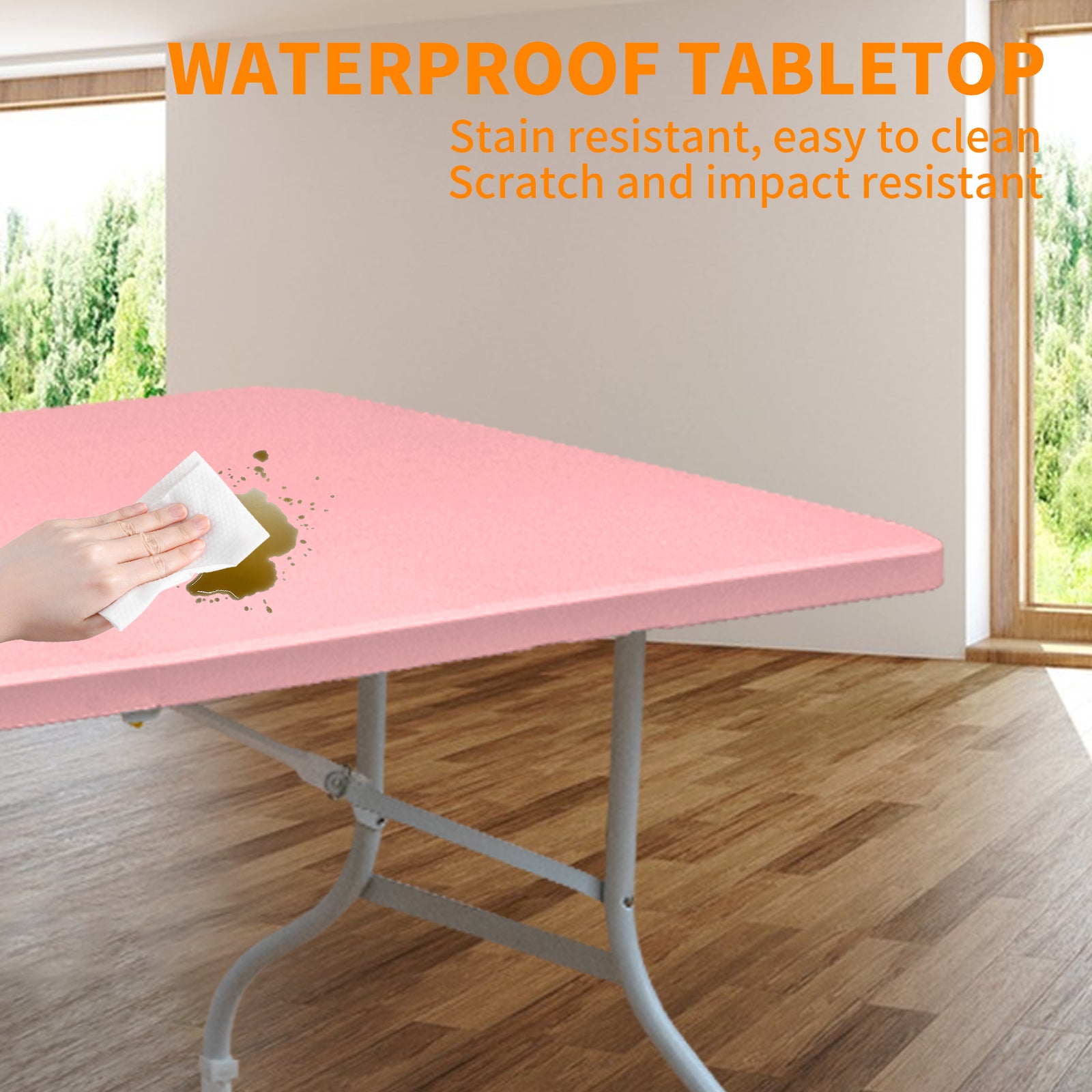 Pink waterproof tabletop shown with a spill being wiped clean