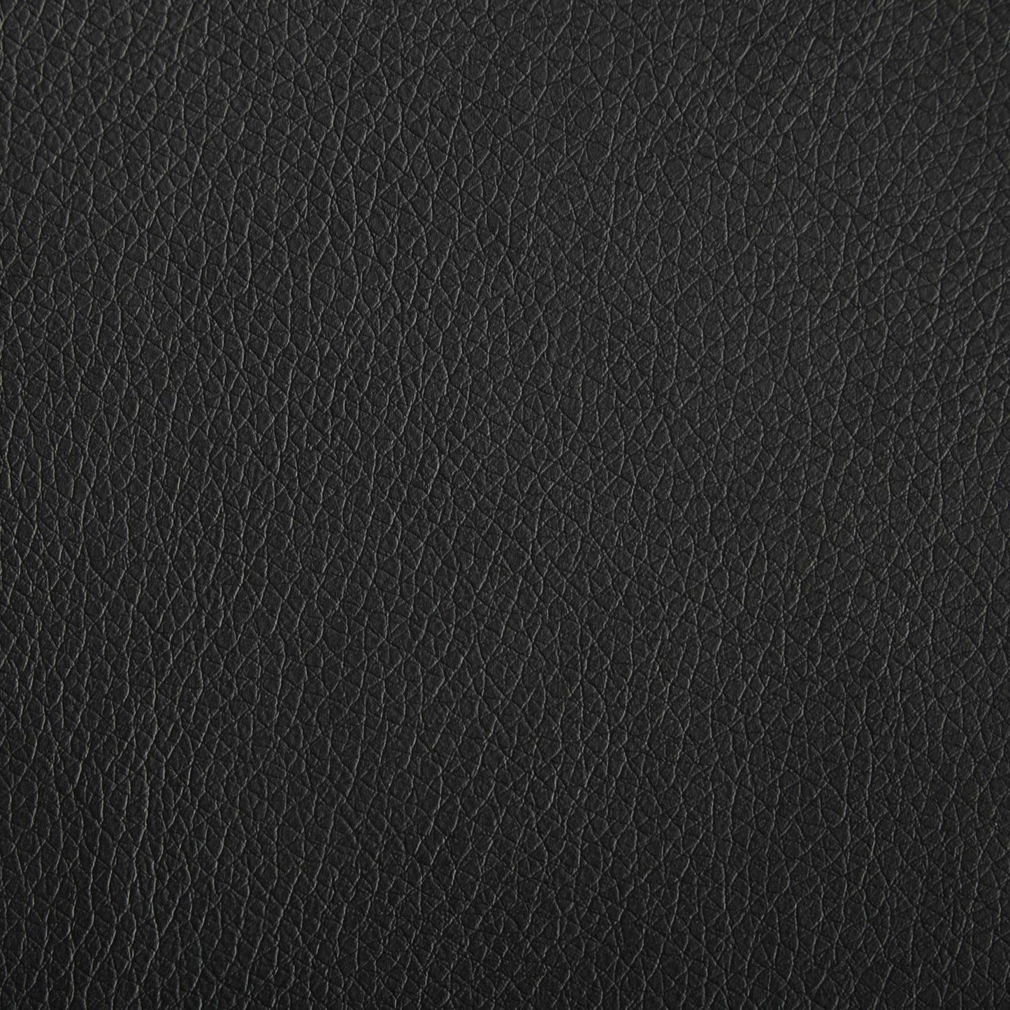 Closeup of black faux leather texture ideal for upholstery