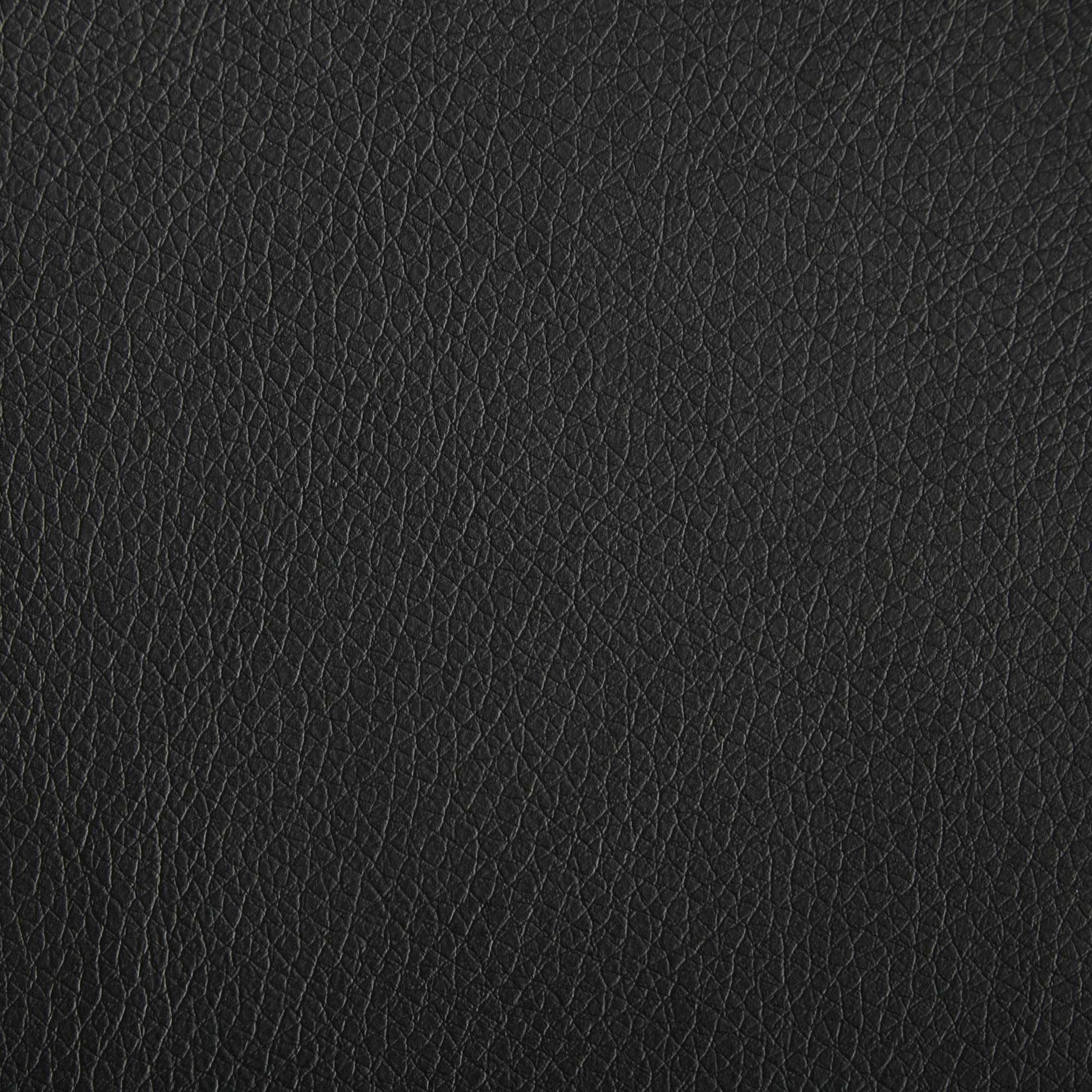 Closeup of black faux leather texture ideal for upholstery