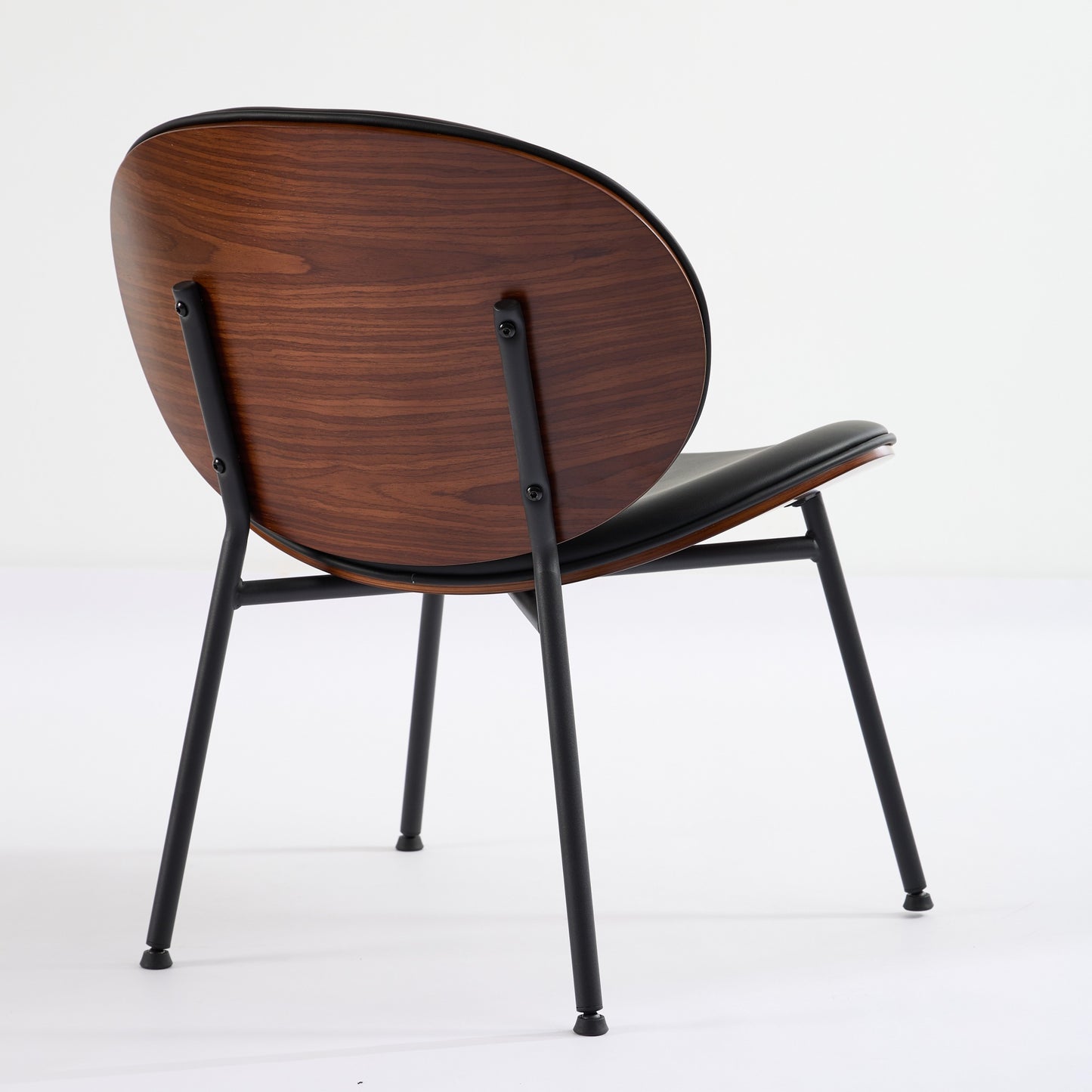 Walnut veneer accent chair with black faux leather seat and metal legs