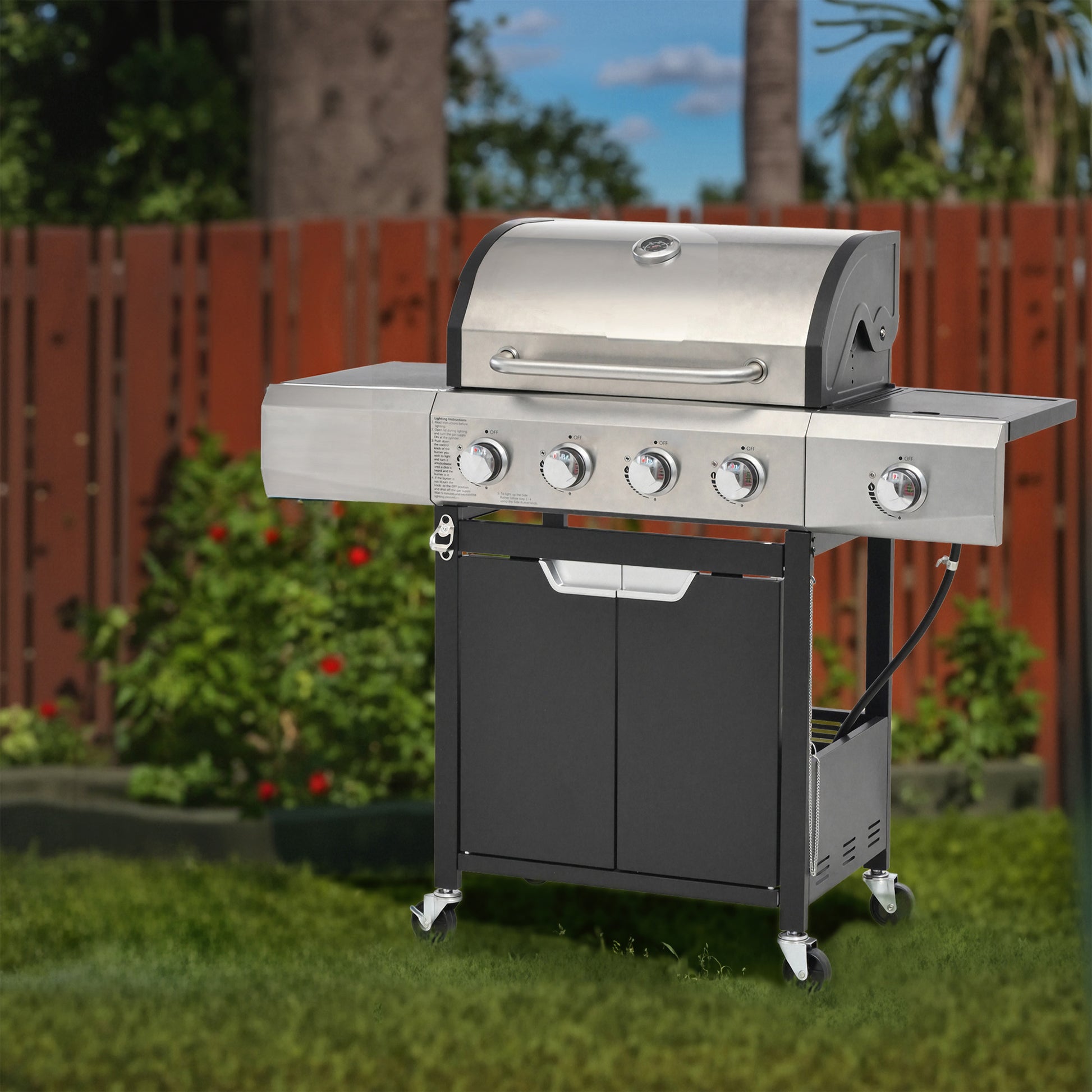 Stainless steel burner gas grill with black cabinet and side shelf