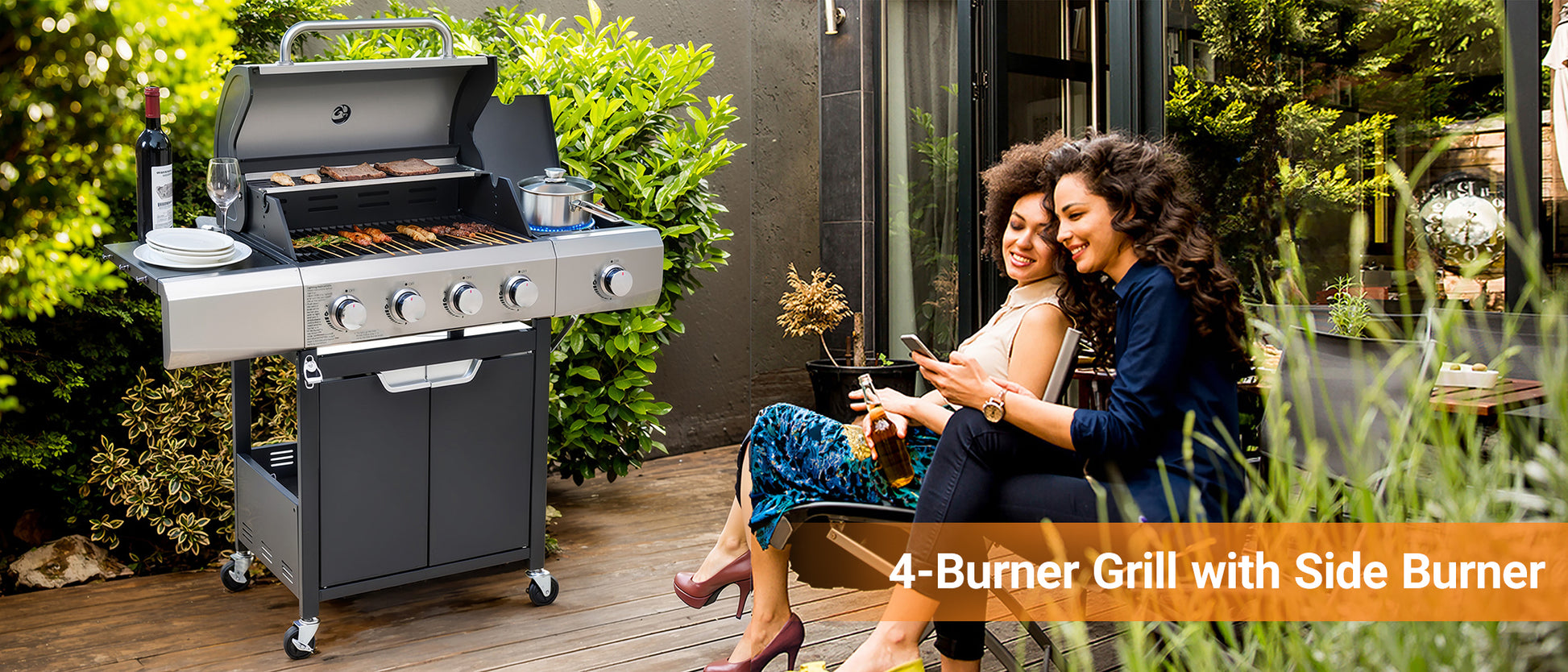 Stainless steel burner grill with side burner cooking steaks and kebabs outdoors