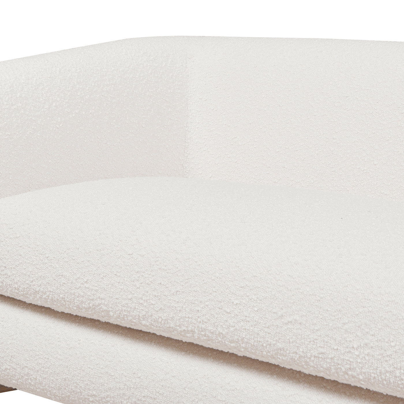 Textured cream boucle sofa fabric with plush cushioning and elegant curves for modern living