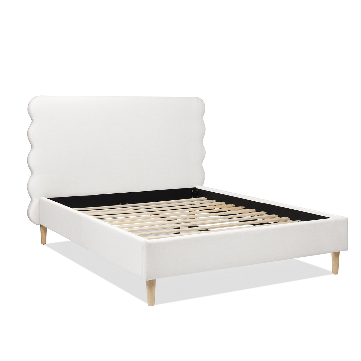 White upholstered queen bed frame with scalloped headboard and wooden slats