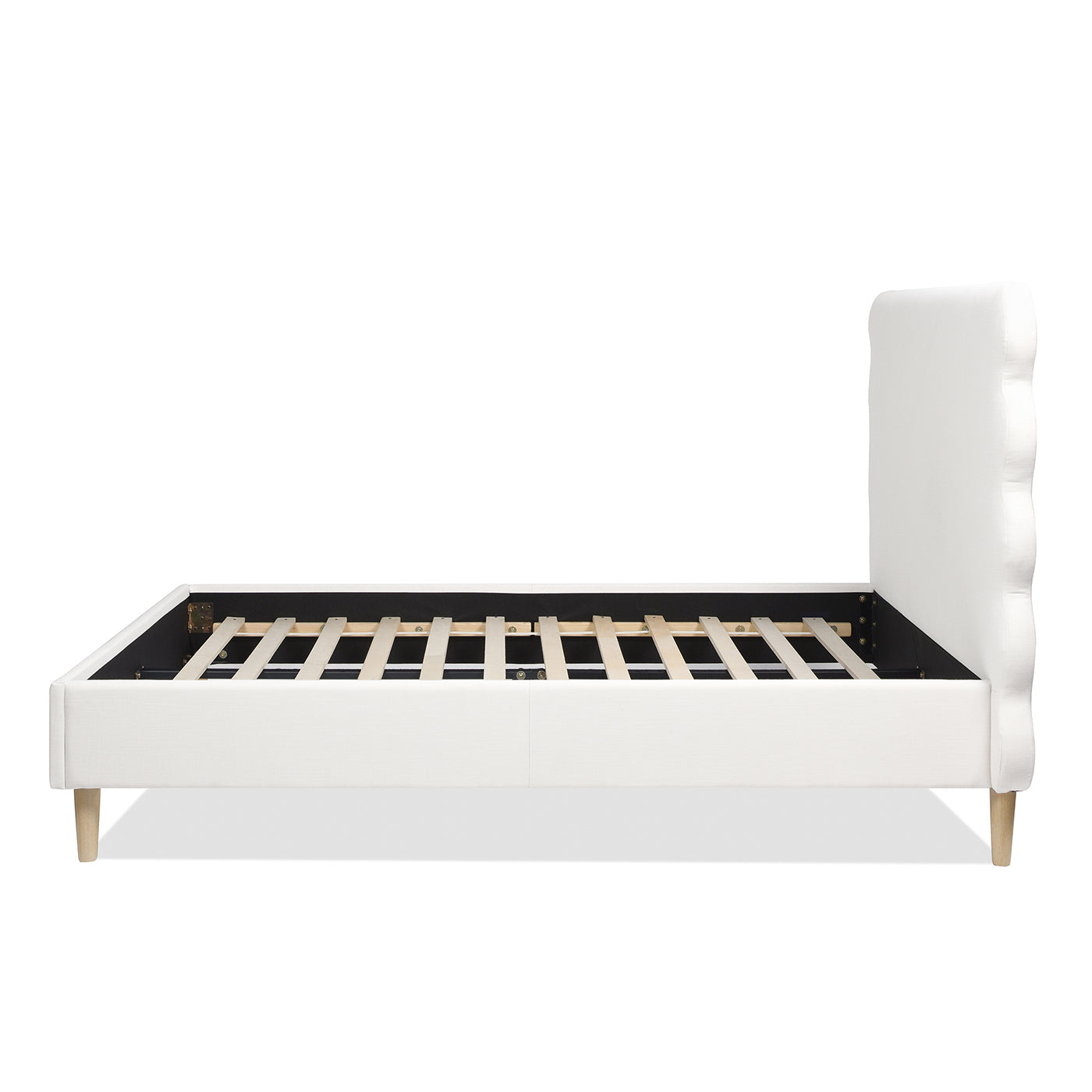 White fabric upholstered bed frame with wooden slats and tapered legs