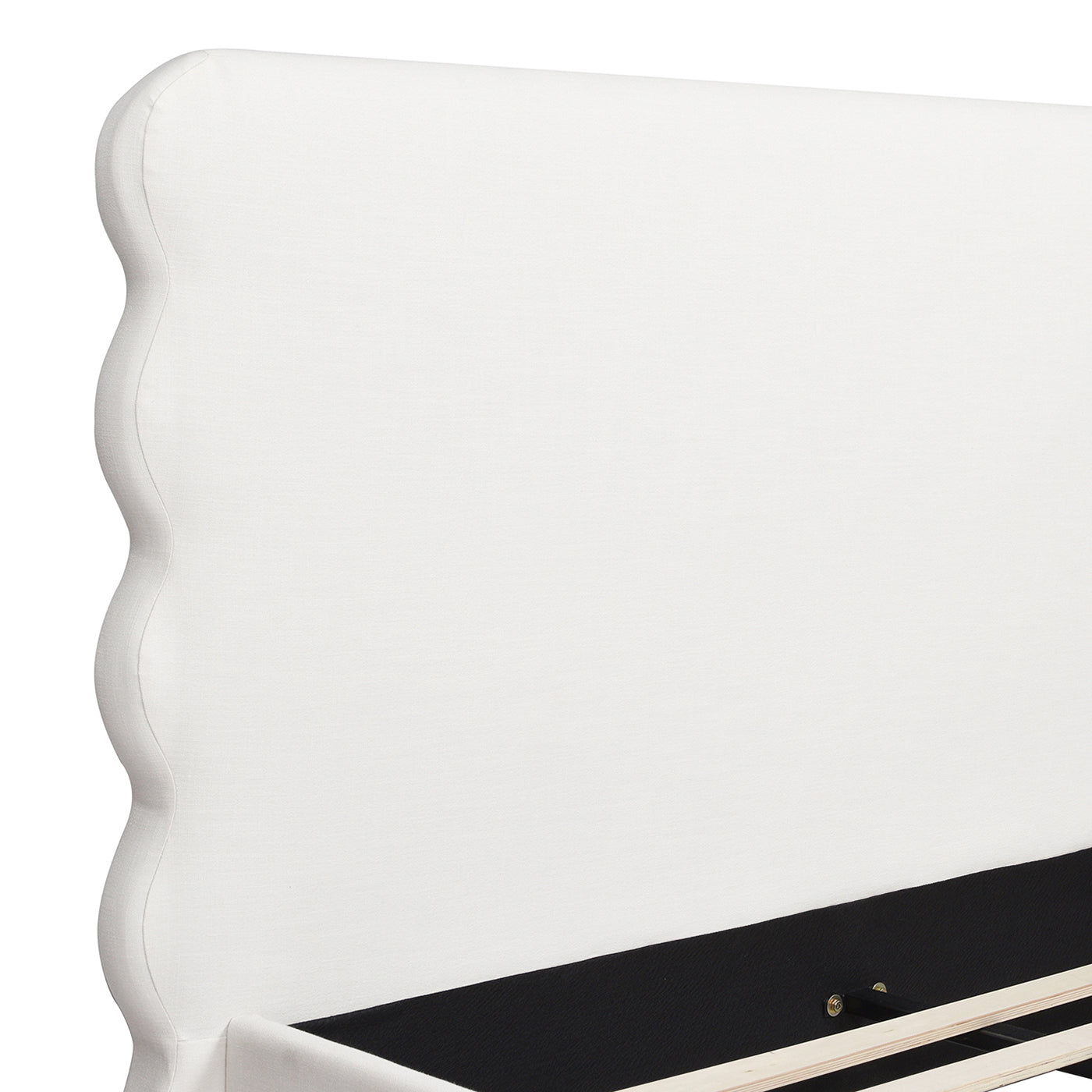 White upholstered bed frame with scalloped headboard elegant bedroom furniture