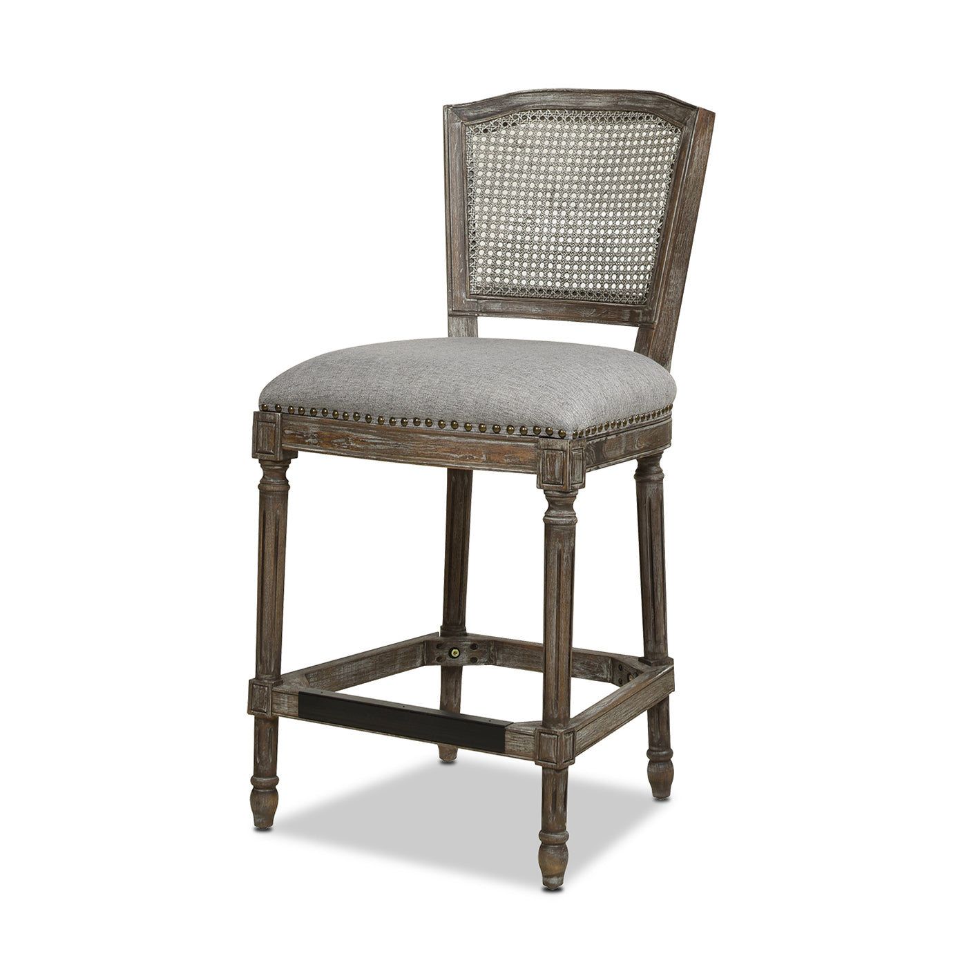 Gray upholstered counter stool with cane back and distressed wood frame