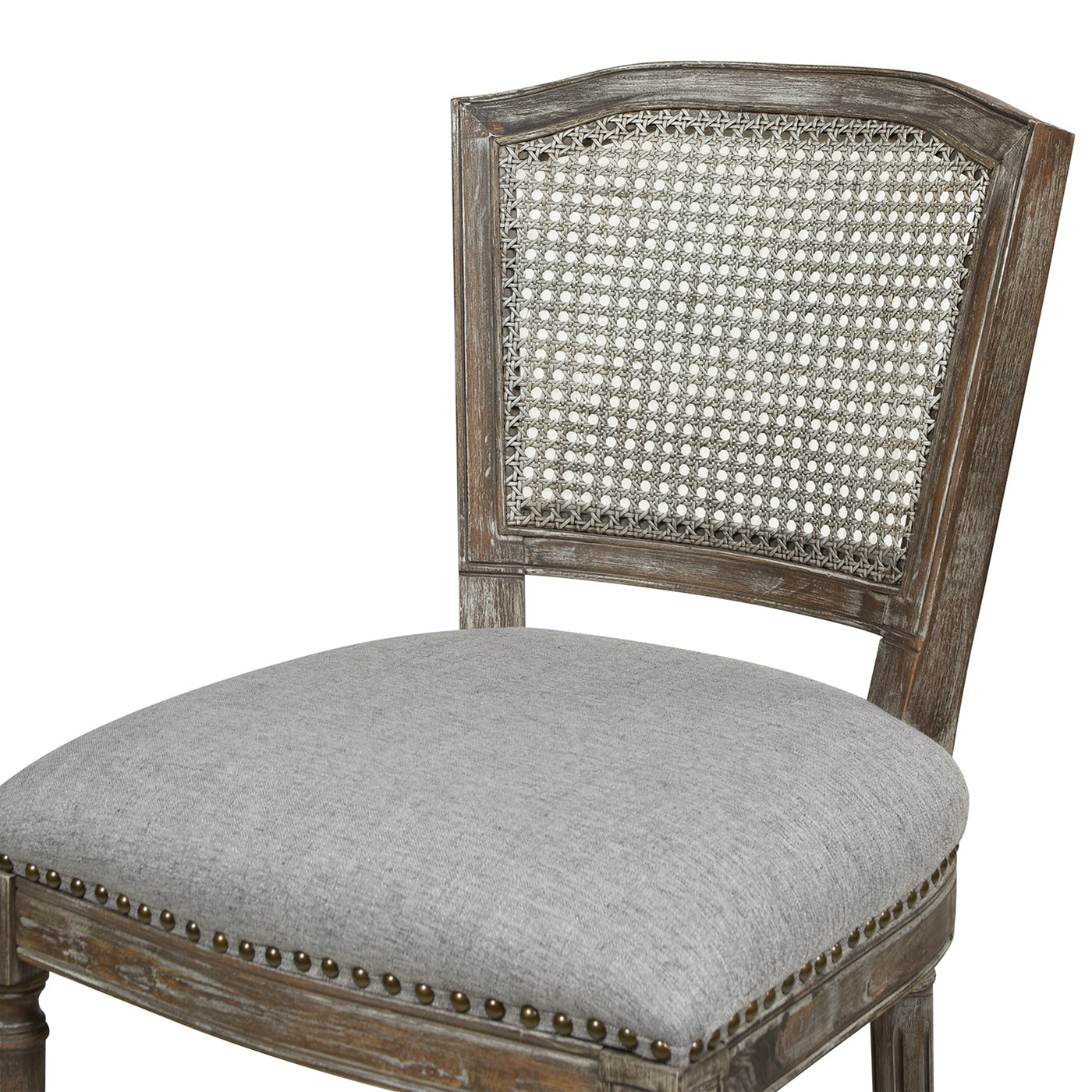 Distressed wood cane back chair with upholstered grey seat for dining room elegance