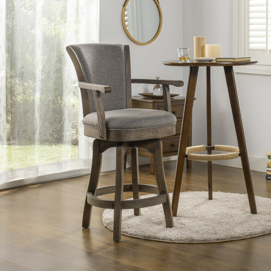 Gray fabric swivel bar stool with wooden base and footrest