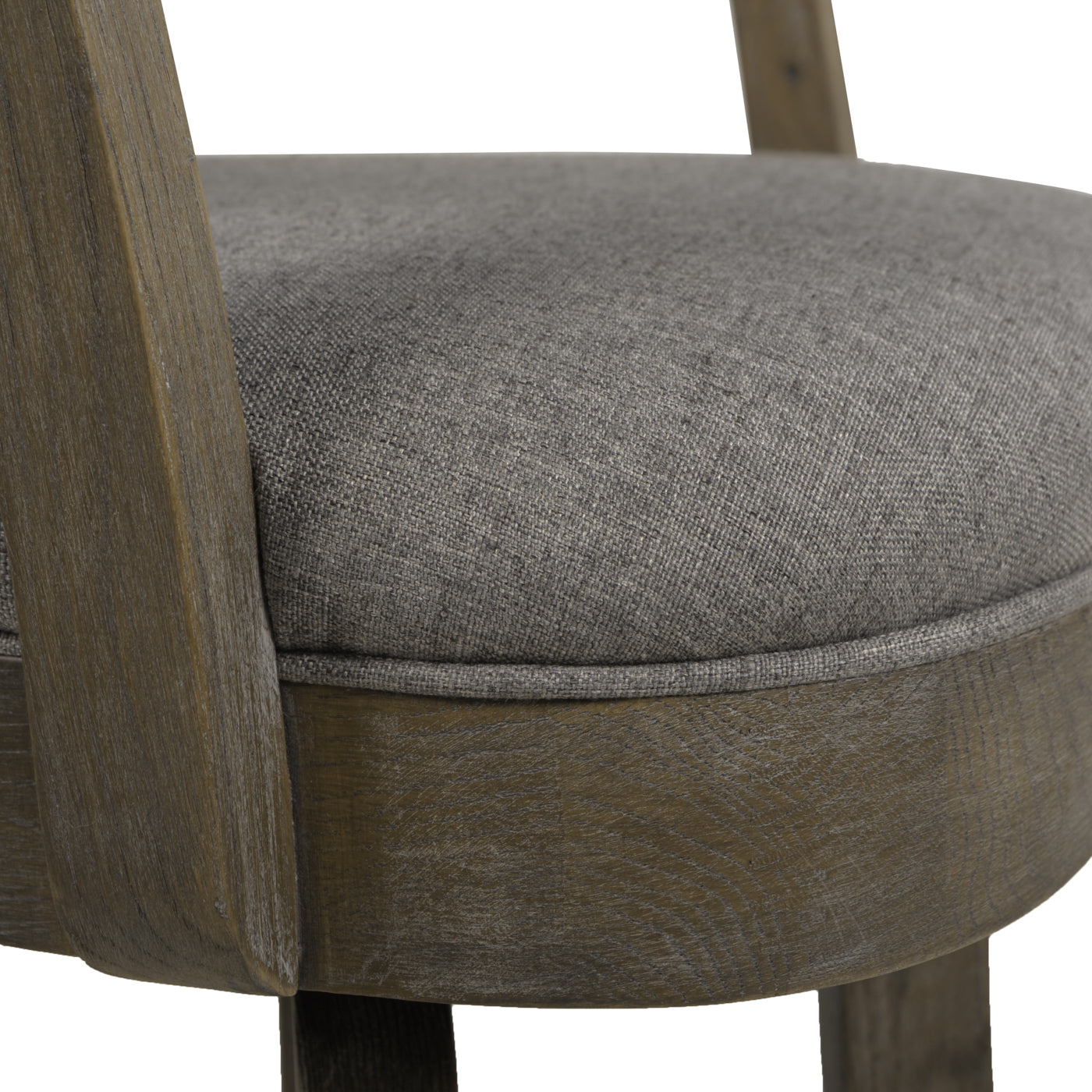 Closeup of a textured gray upholstered seat on a distressed wood frame chair