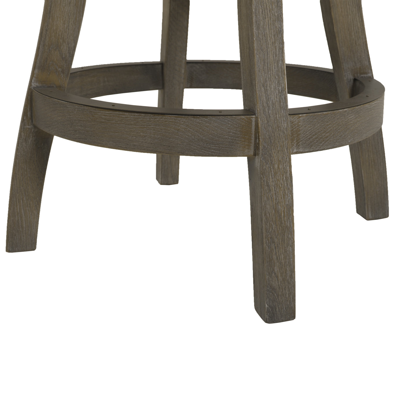 Closeup of distressed gray wood bar stool legs with a dark metal footrest ring