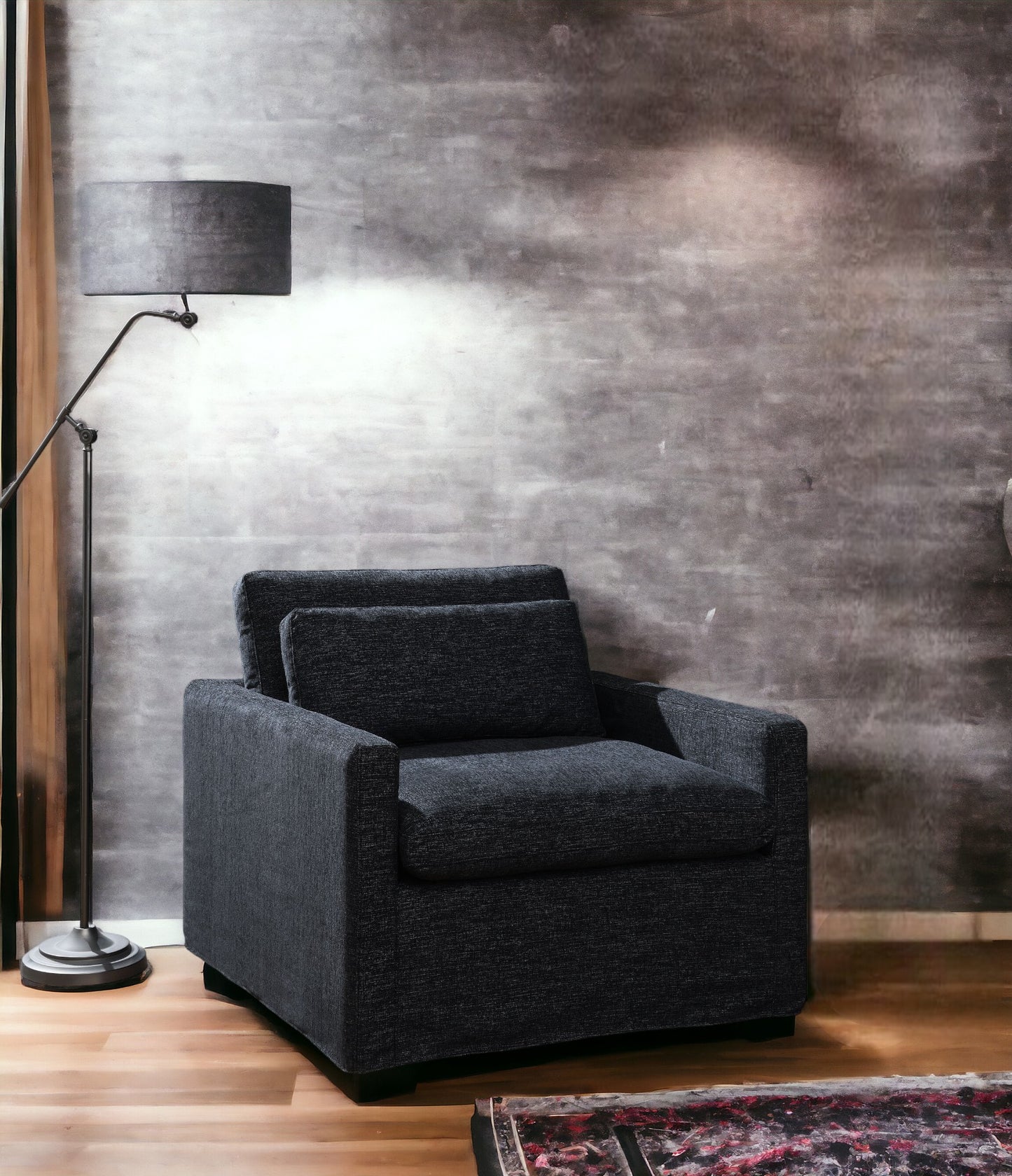 Dark charcoal fabric armchair with modern design perfect for living room seating