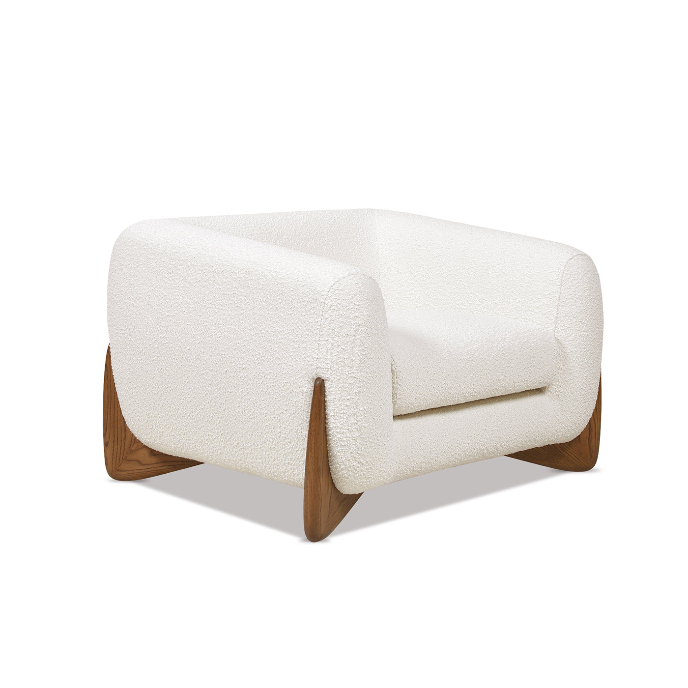 White boucl armchair with natural wood angled legs