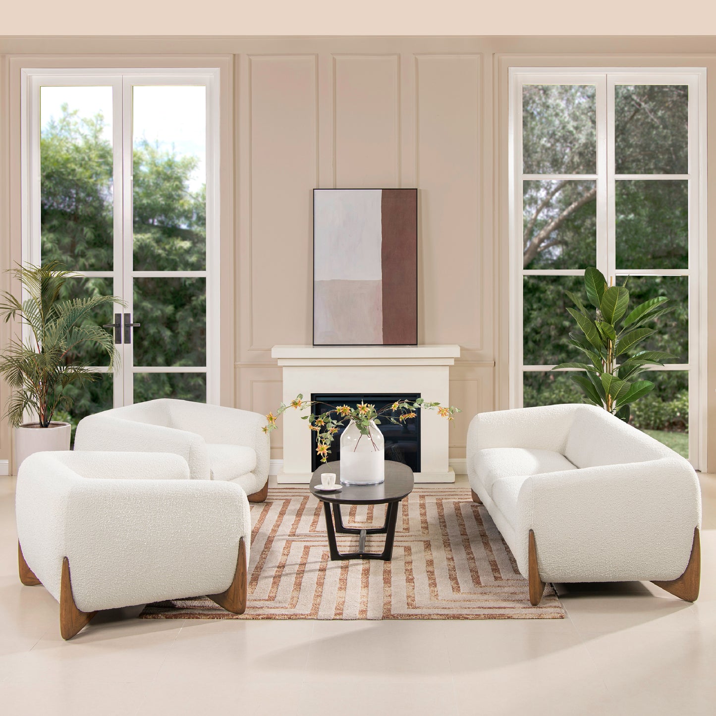 Plush boucle fabric sofa in creamy white with curved modern design and wooden legs