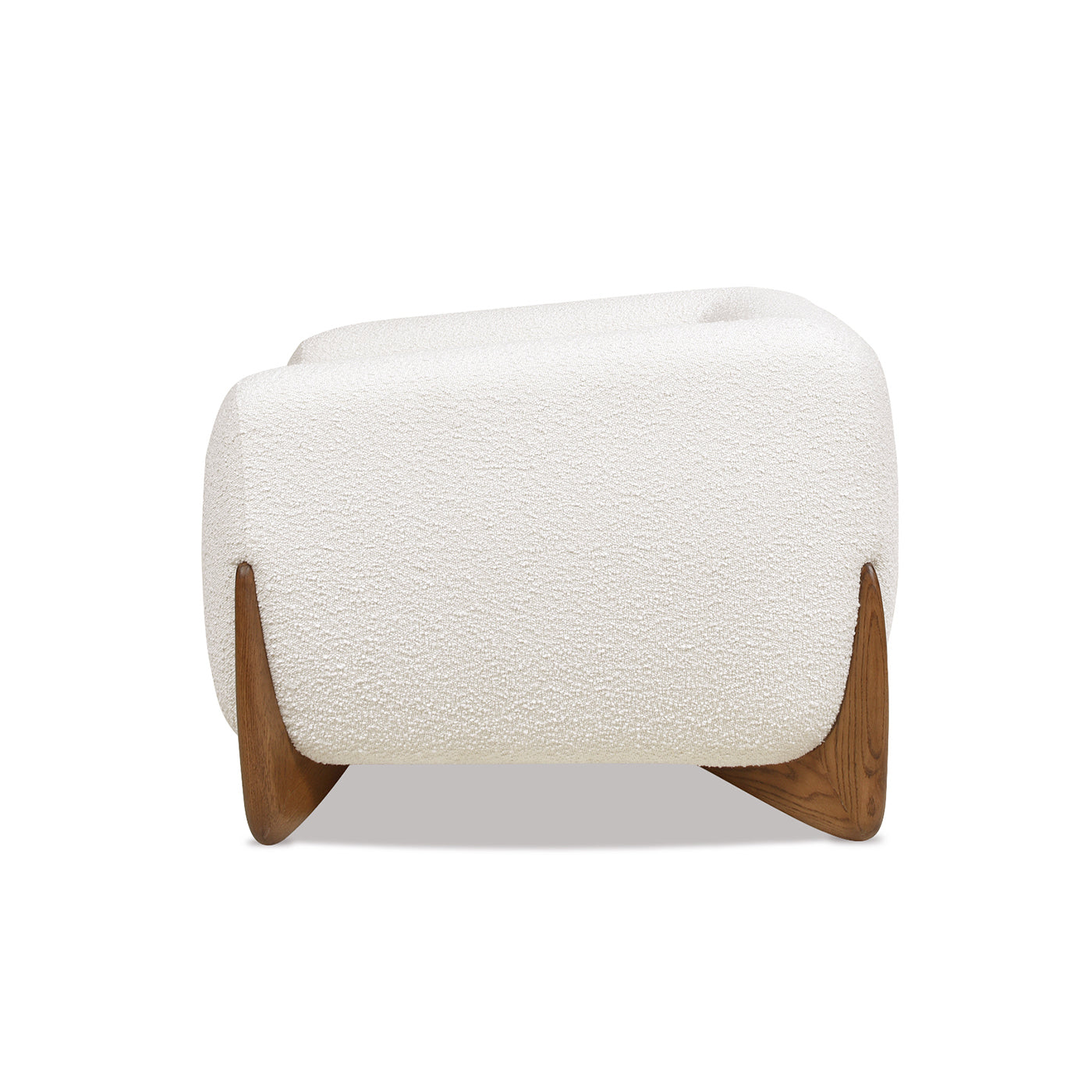 Plush white boucle ottoman with angled walnut wood legs