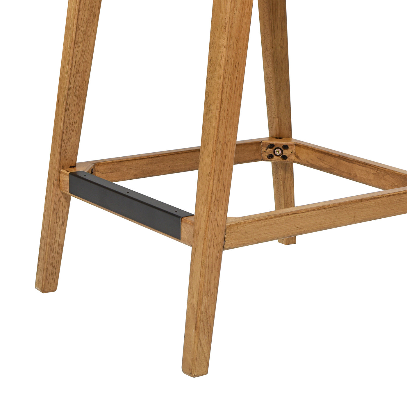 Closeup of the base of a natural wood bar stool with black metal footrest detail