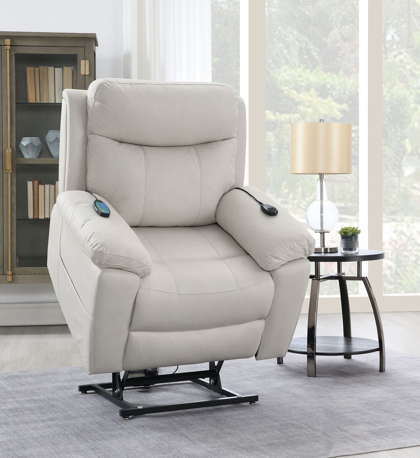 Cream leather lift recliner chair with remote control and power lift mechanism