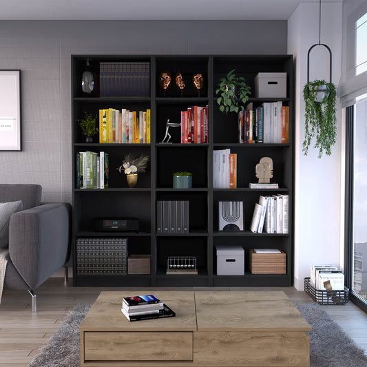 Black modular bookshelf filled with books decorative items and storage boxes