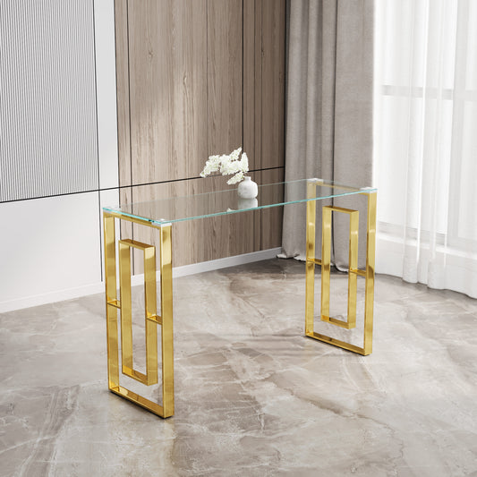 Modern glass console table with gold geometric base perfect for entryway styling