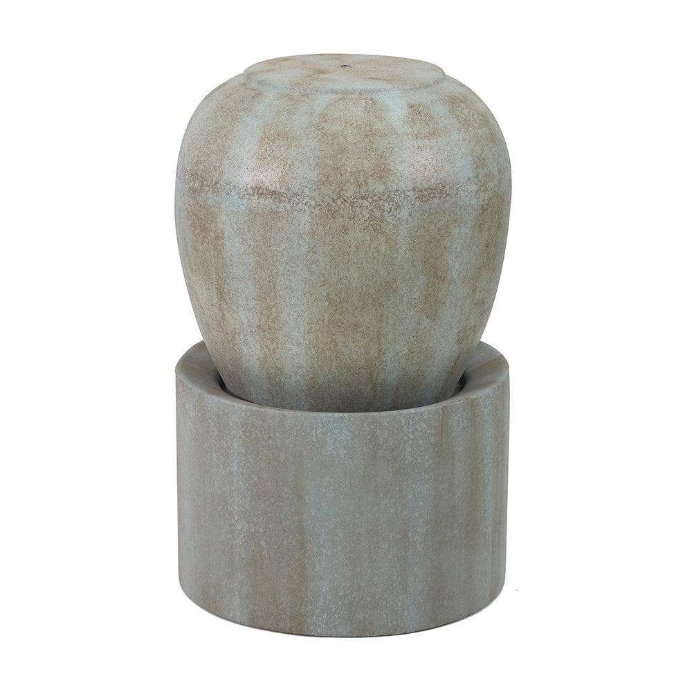A light blue and tan ceramic garden fountain with a textured urn atop a cylindrical base