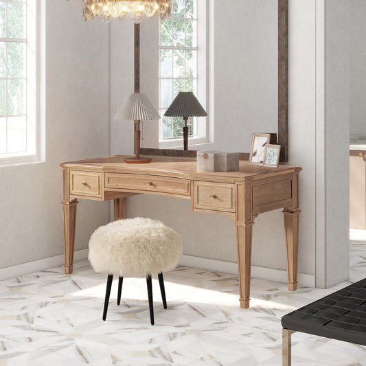 Light oak vanity desk with ornate legs featuring three drawers and brass hardware for makeup organization