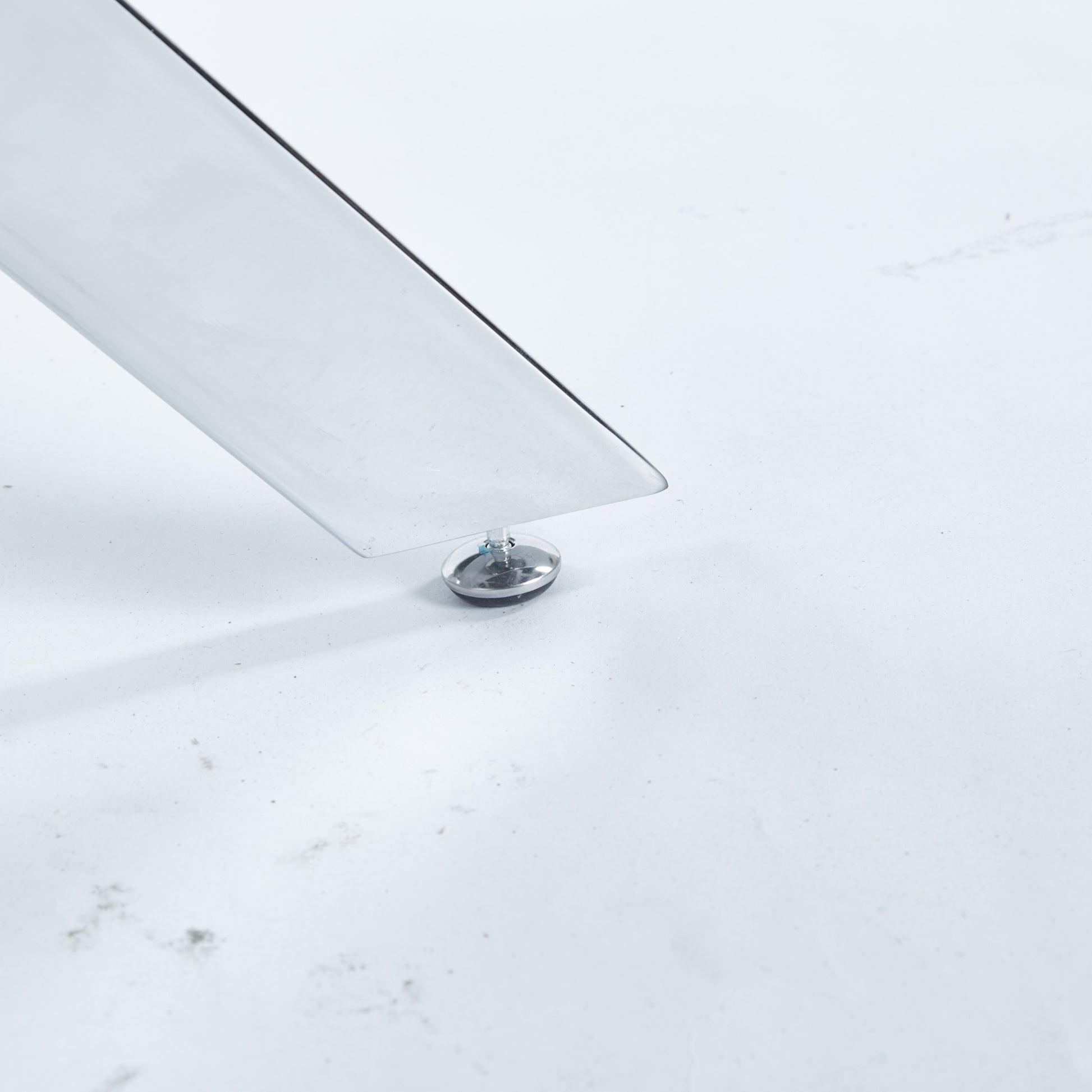 Polished chrome furniture leg with adjustable leveling foot