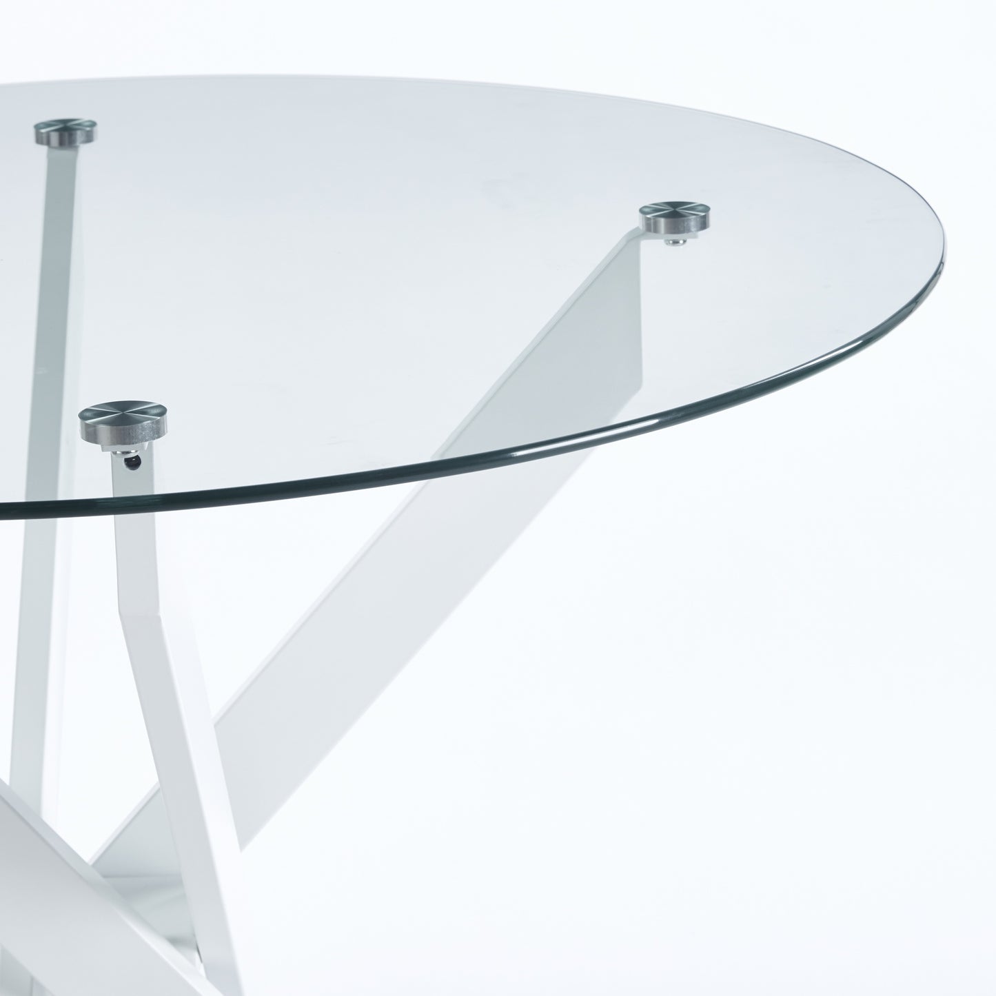 Round glass tabletop with polished chrome fasteners and a white geometric base