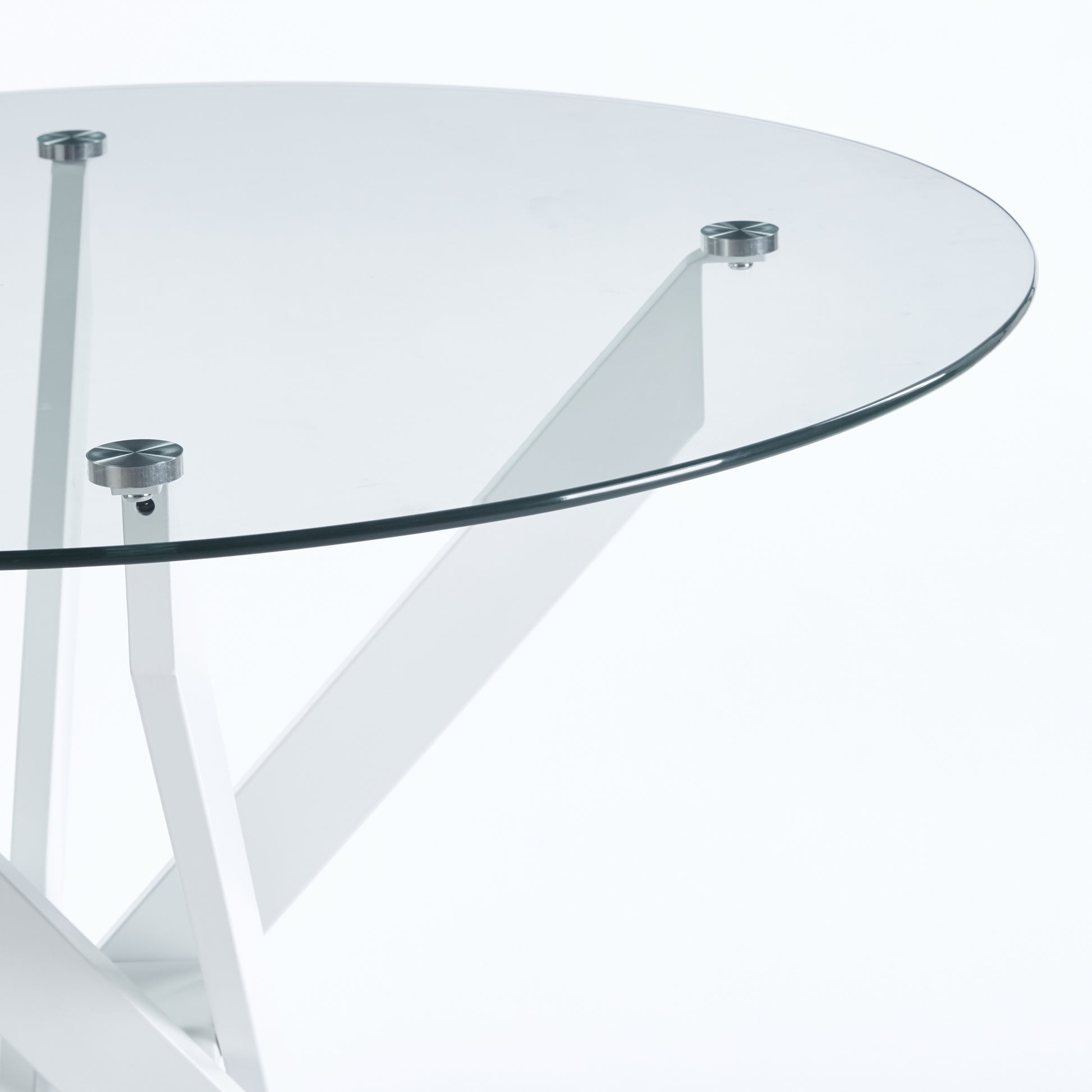 Round glass tabletop with polished chrome fasteners and a white geometric base