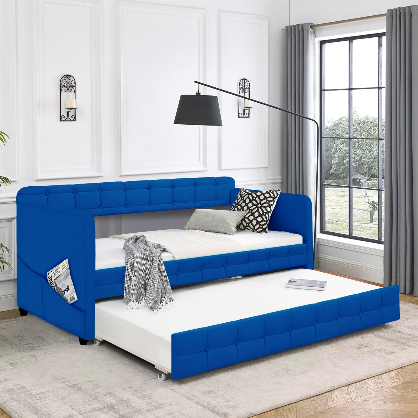 Tufted royal blue velvet daybed with pullout trundle