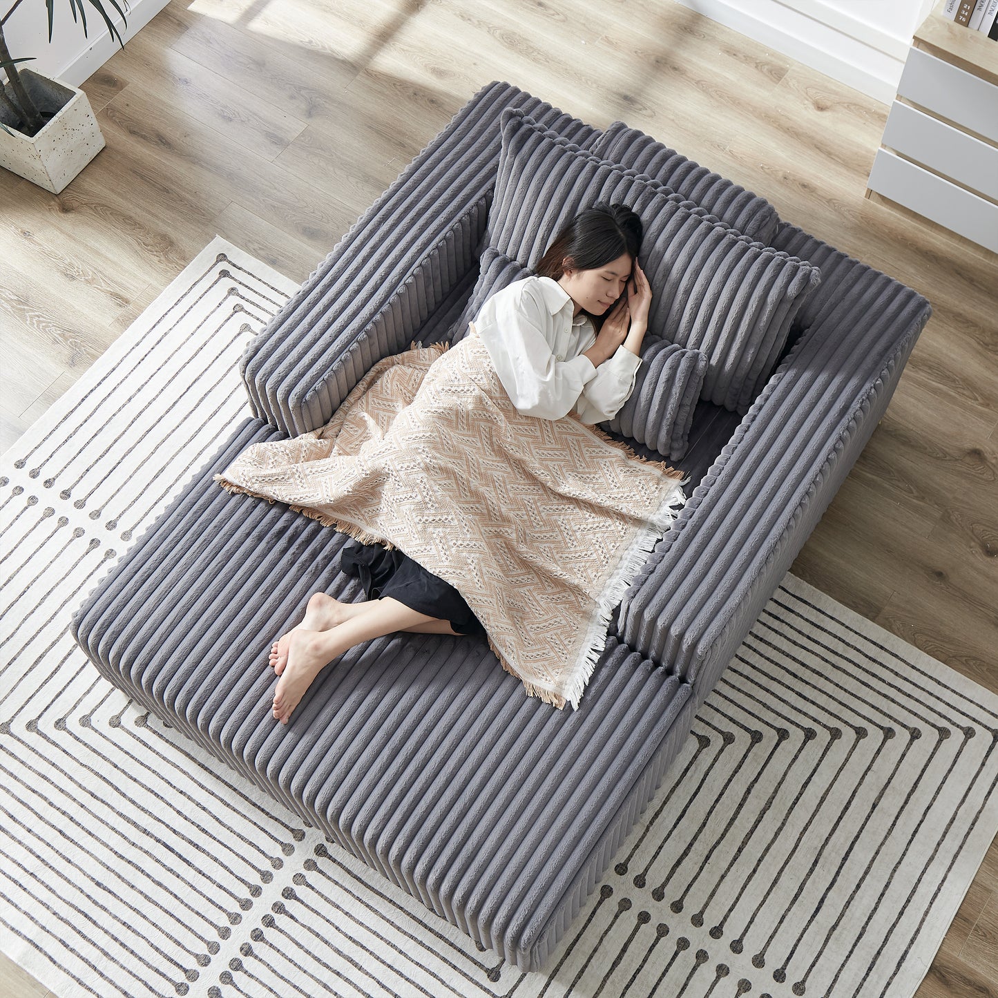 Gray corduroy sectional sofa with plush cushions perfect for modern living rooms